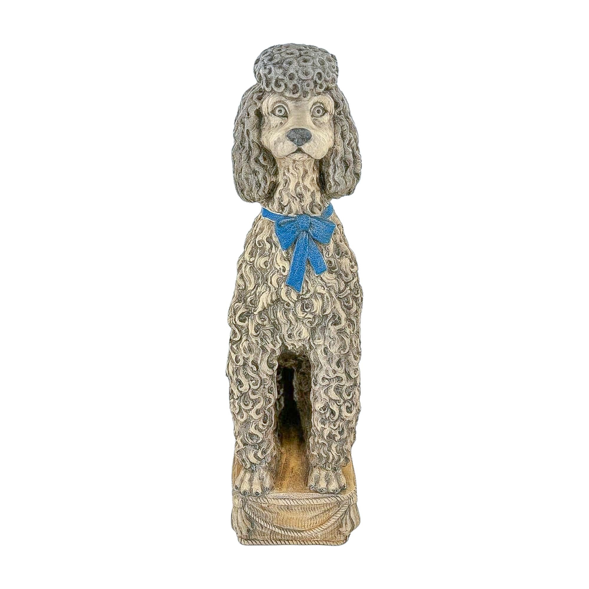 This vintage poodle figurine captures all the charm and elegance of the breed with remarkable detail. Standing tall with a proud expression, the figure is richly textured to emphasize its signature curly coat, finished in a warm gray palette that