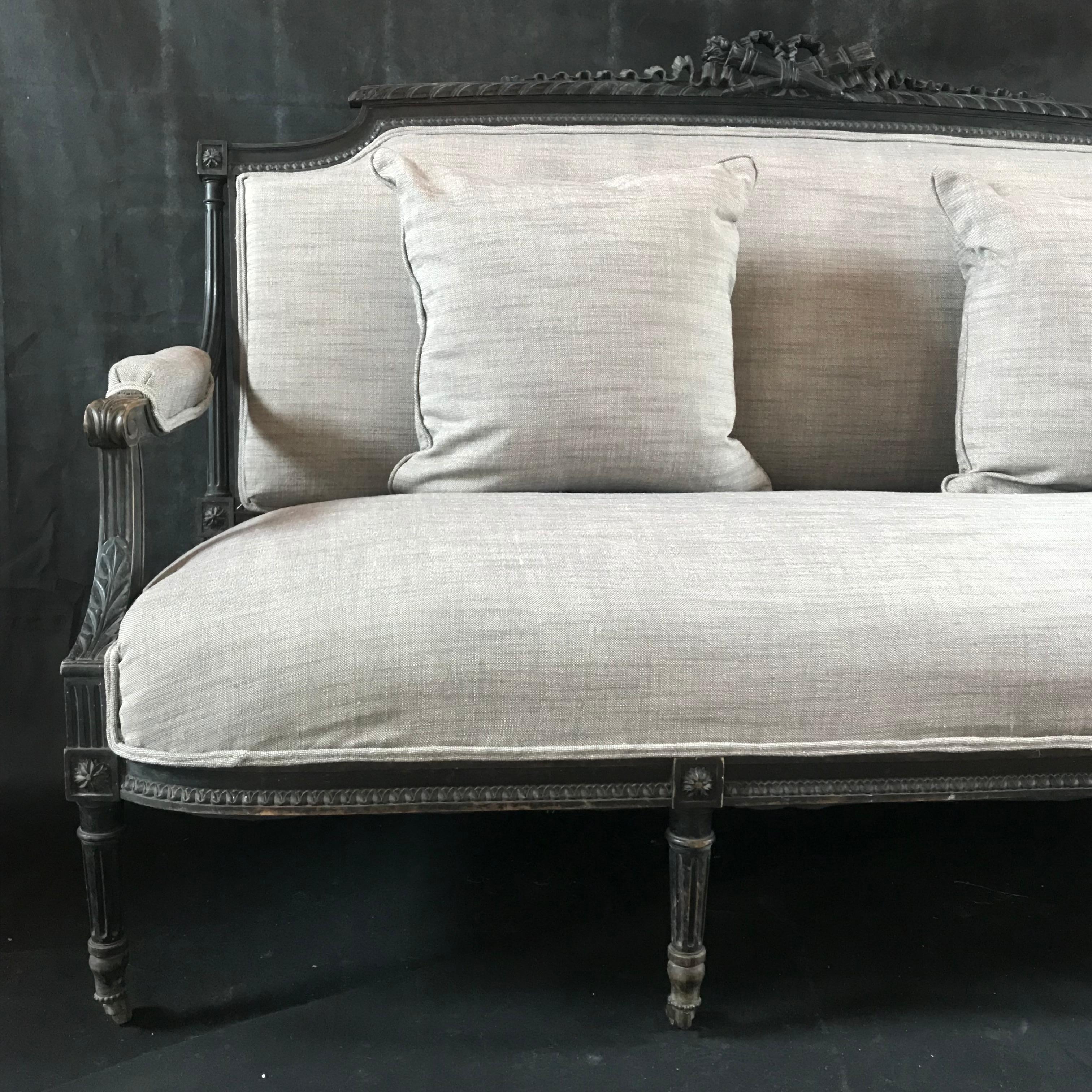 French Magnificent Louis XVI Carved Wood and Linen Sofa For Sale
