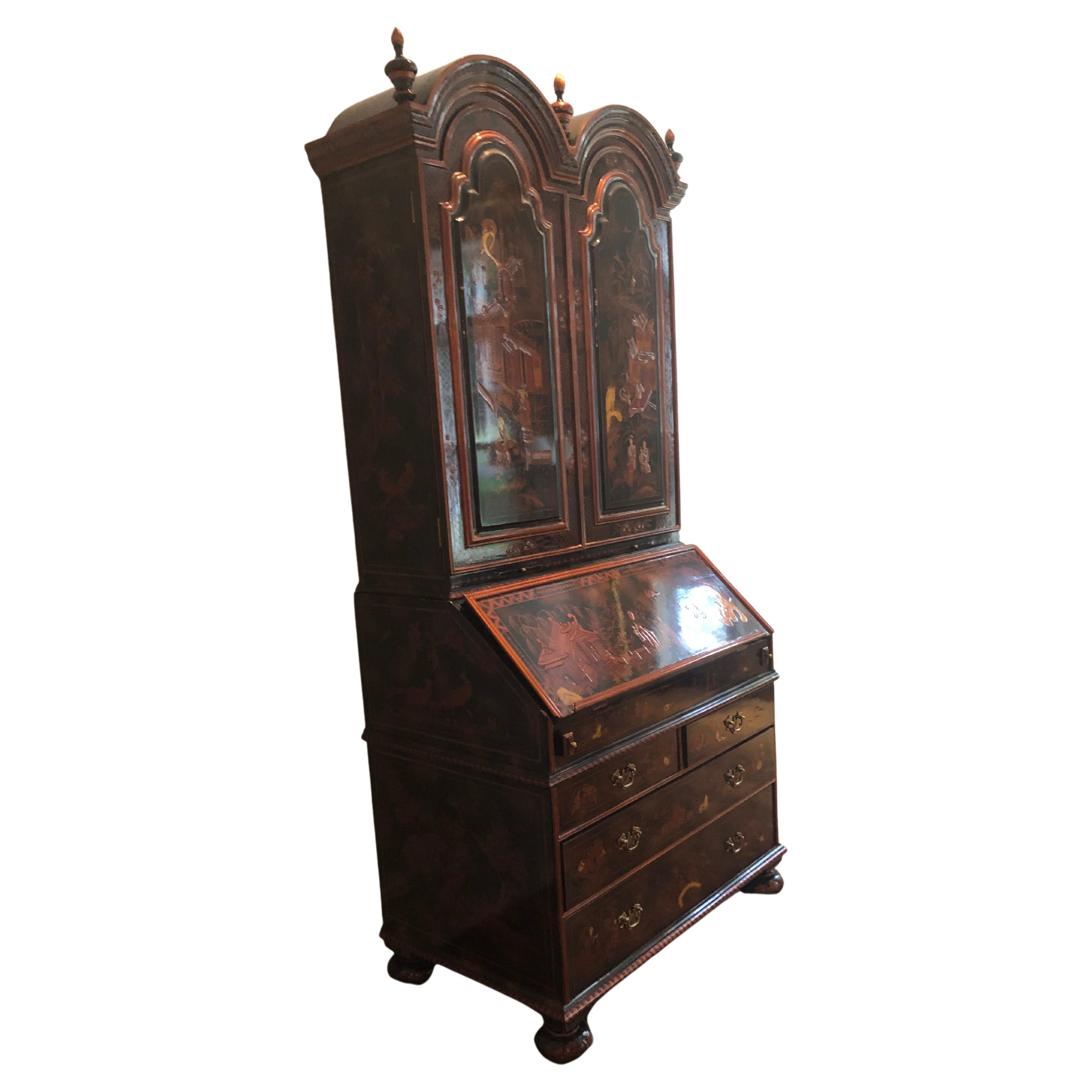 Magnificent Maitland Smith hand painted lacquer and raised enamel Chinoiserie secretary desk having many drawers, some of which are secret or hidden. 
Pull out supports hold the drop front writing surface, which features a tooled leather top and