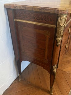 Magnificent marquetry chest of drawers with bronze marble top