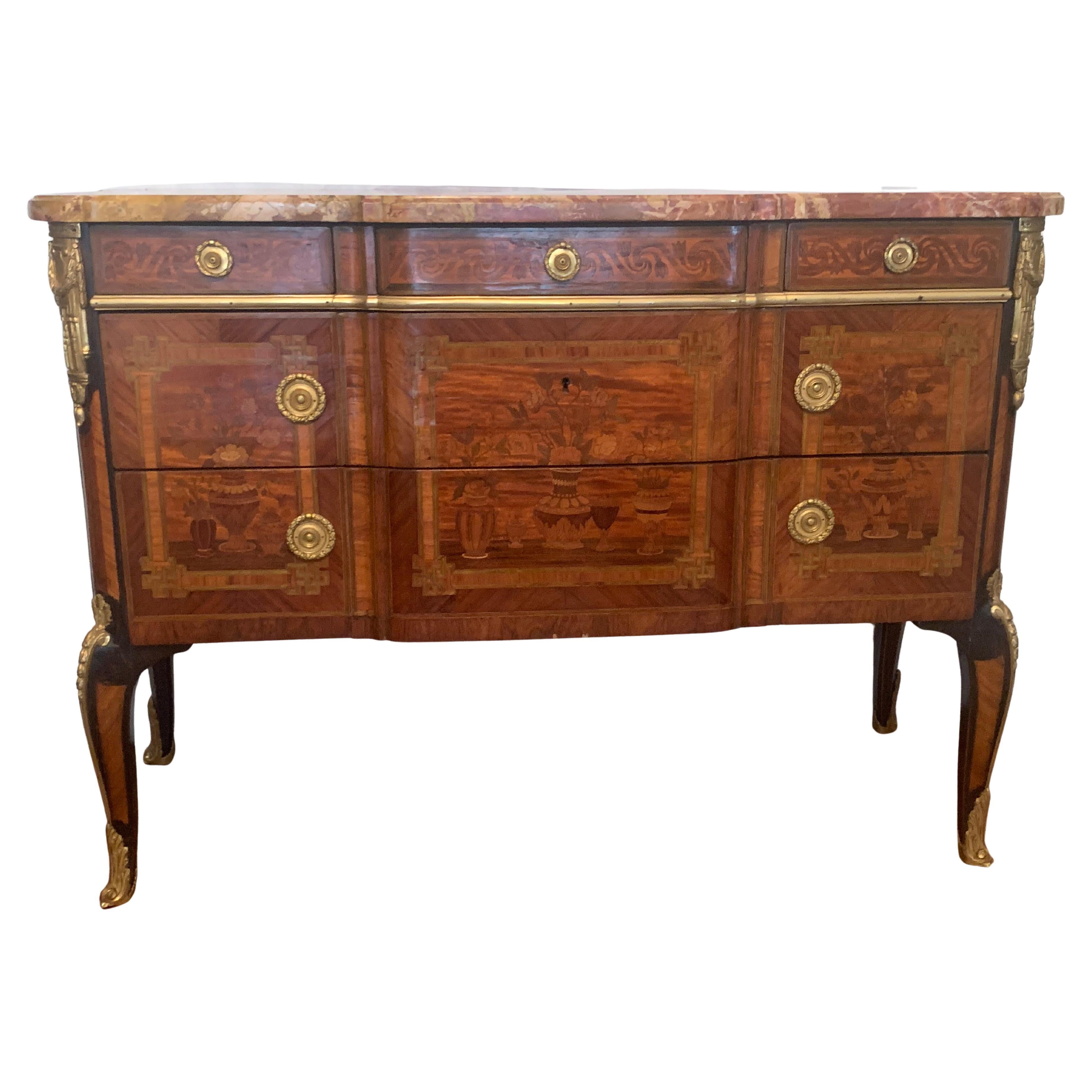 Magnificent marquetry chest of drawers with bronze marble top im Angebot