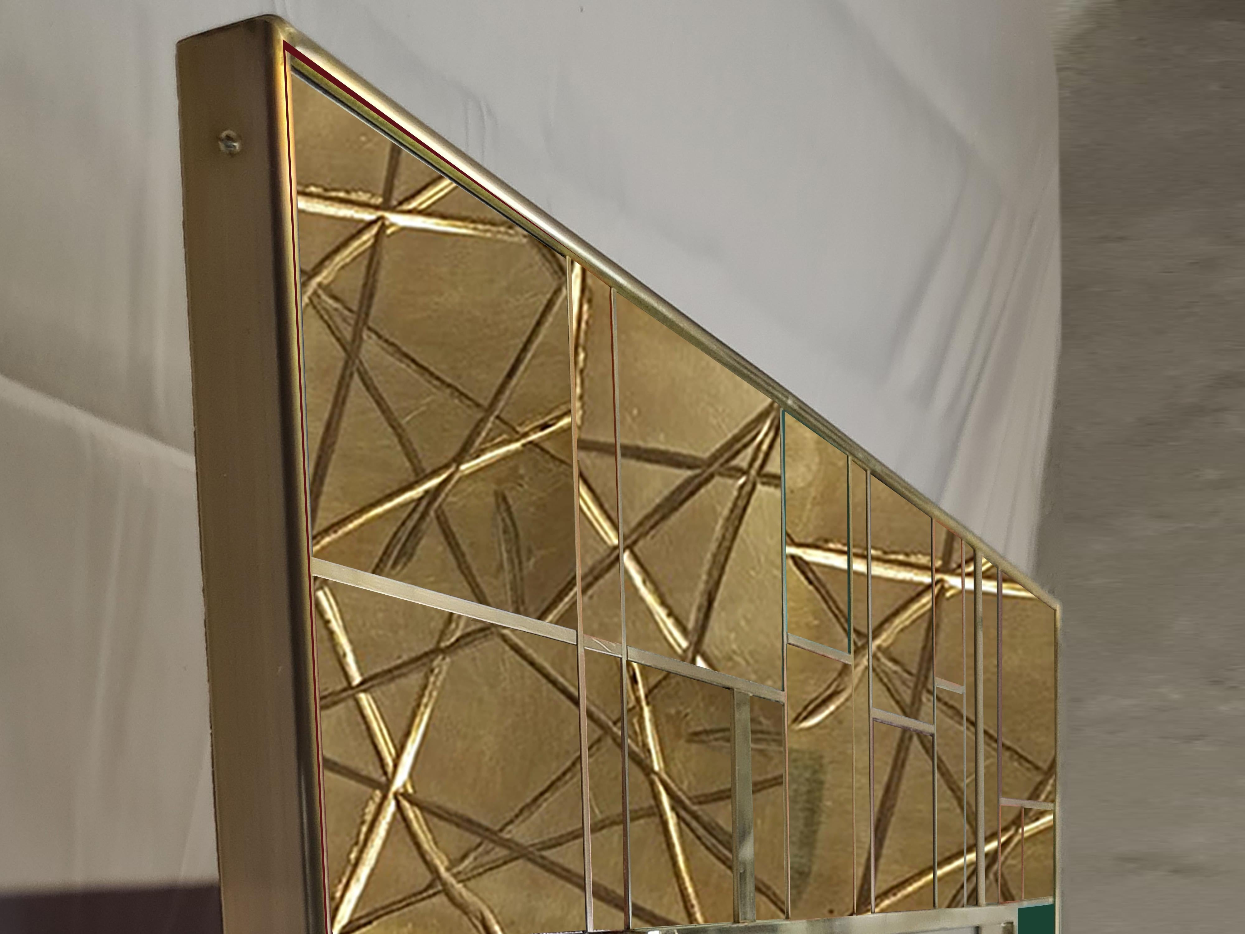 This magnificent mid-century wall mirror features a stunning combination of dark green Murano glass and intricately carved brass, embodying the essence of Italian design. 

The solid birch wood frame features elegant L-shaped brass accents that