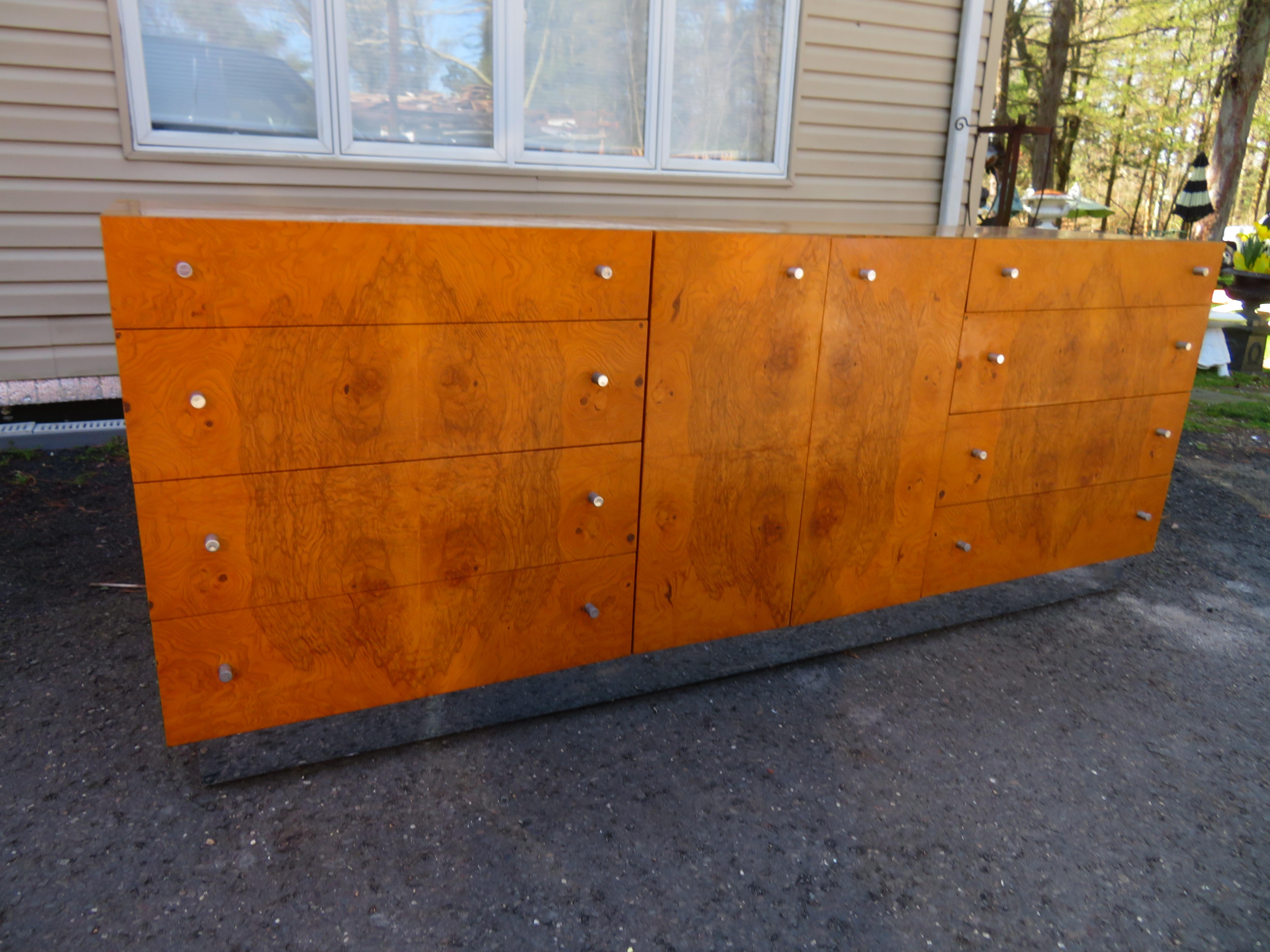 Magnificent Milo Baughman for Thayer Coggin burl Olive wood credenza. This piece is in very nice vintage condition and is quite rare. This credenza measures 33