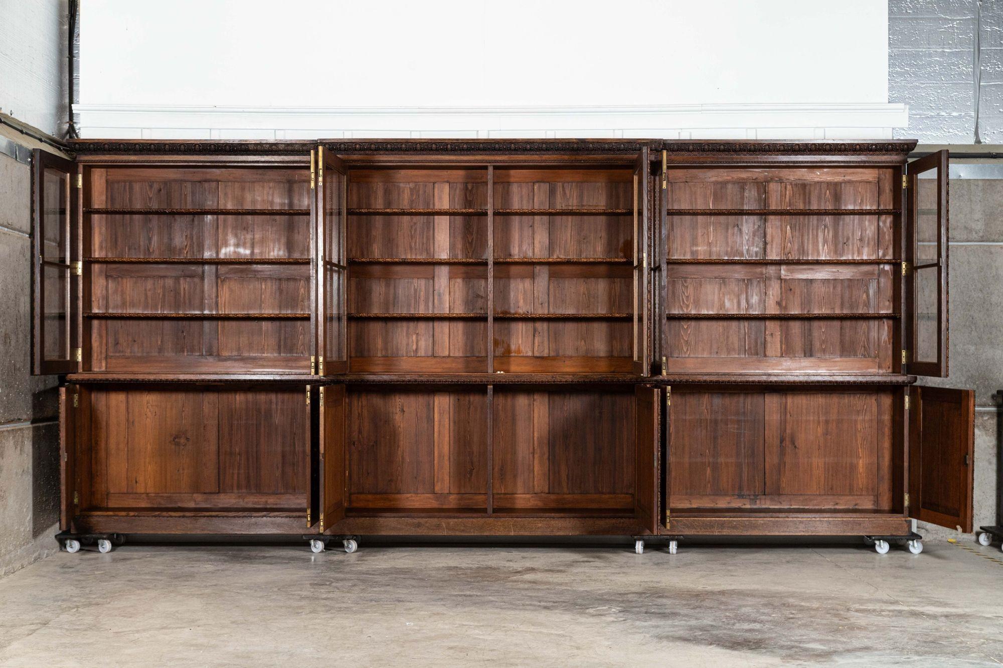 19th Century Magnificent Monumental English 19thC Carved Oak Breakfront Glazed Bookcase For Sale