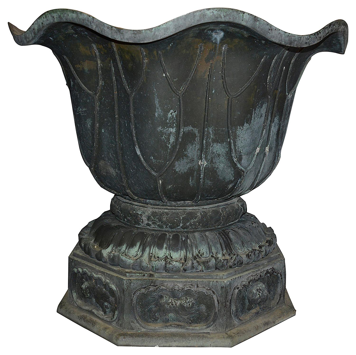 This is a rare and unique piece of Japanese verdigris bronze art. 
Meiji period (1868-1912) The sheer size, condition and unusual design in the form of a huge Lotus leaf, creating this planter that can be used in an indoor setting, terrace or