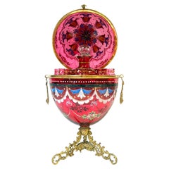 Magnifico servizio “Tantalus” di Moser in vetro color mirtillo rosso, a forma di uovo imperiale, anni ’80 del XIX secolo