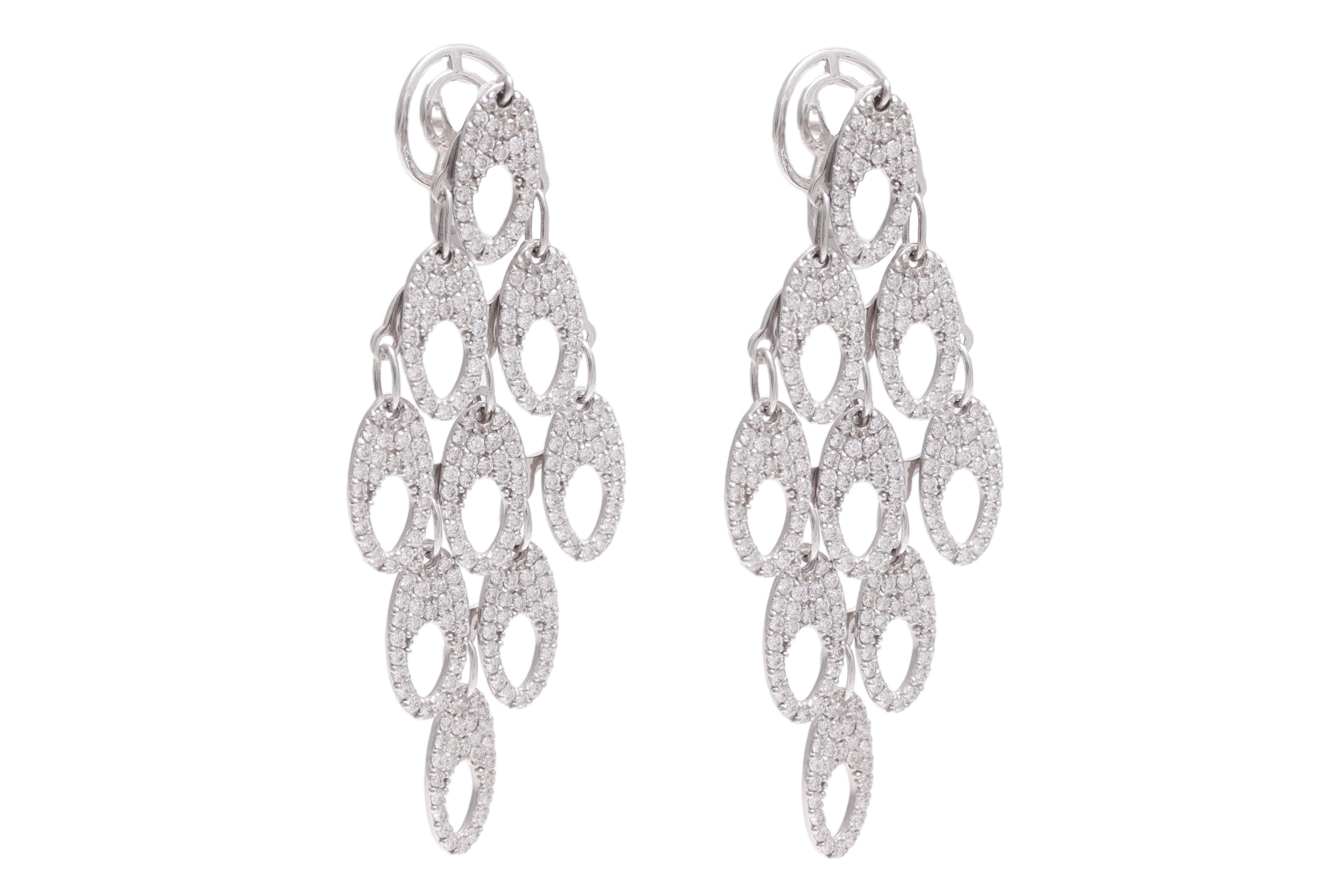 Magnificent Moving 18kt White Gold Chandelier Earrings With Diamonds

Diamonds: Brilliant cut diamonds together 3.77ct G vs

Material: 18kt white gold

Measurements: 58.5 mm x 22.5 mm x 11.2 mm

Total weight: 12.6 gram / 0.445 oz / 8.1 dwt