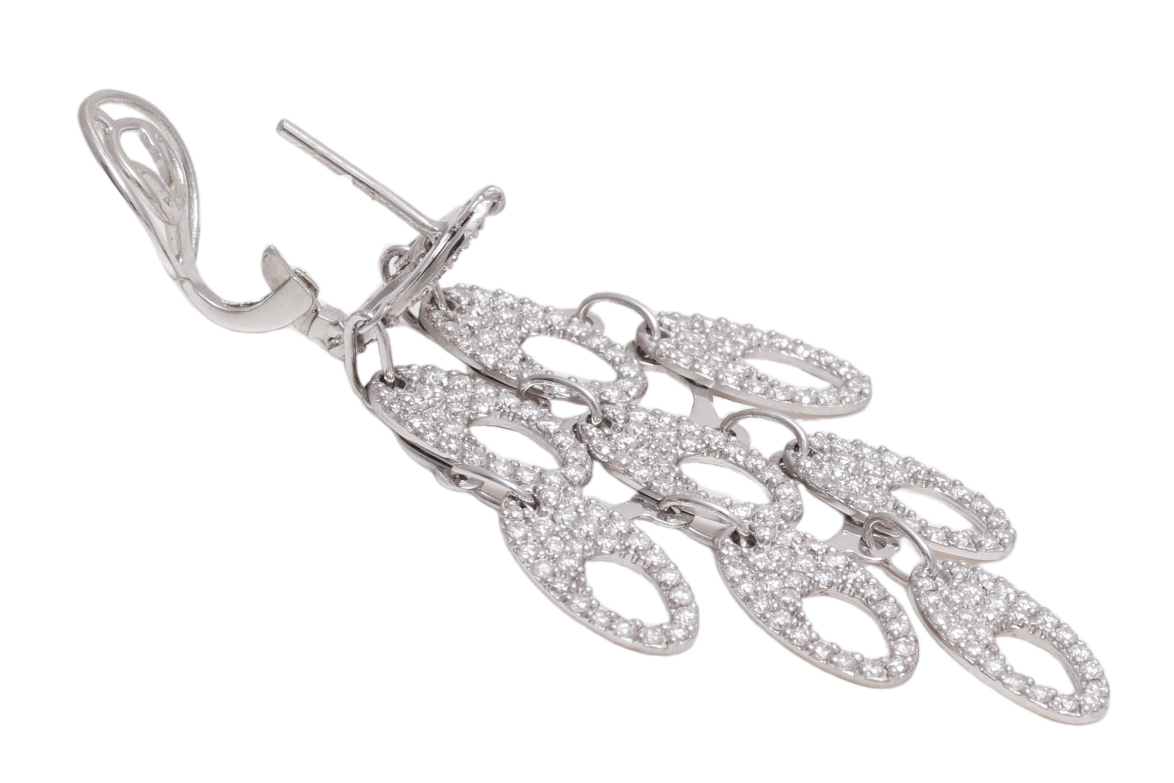 Brilliant Cut Magnificent Moving 18kt White Gold Chandelier Earrings With Diamonds For Sale