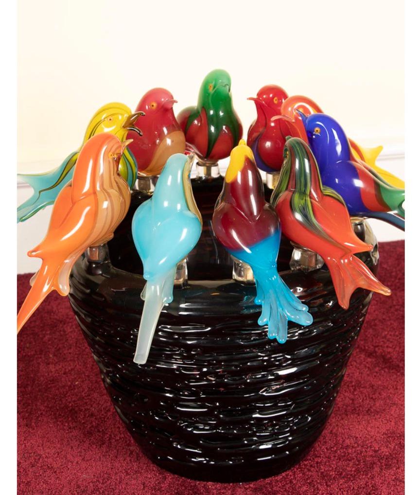 If you love imaginative hand-blown glass, this is the piece to own and admire!!
Extraordinary large hand blown art glass Murano bird sculpture.
Ten gorgeous hand blown birds, each masterfully uniquely multicolored, imagined one at a time. All