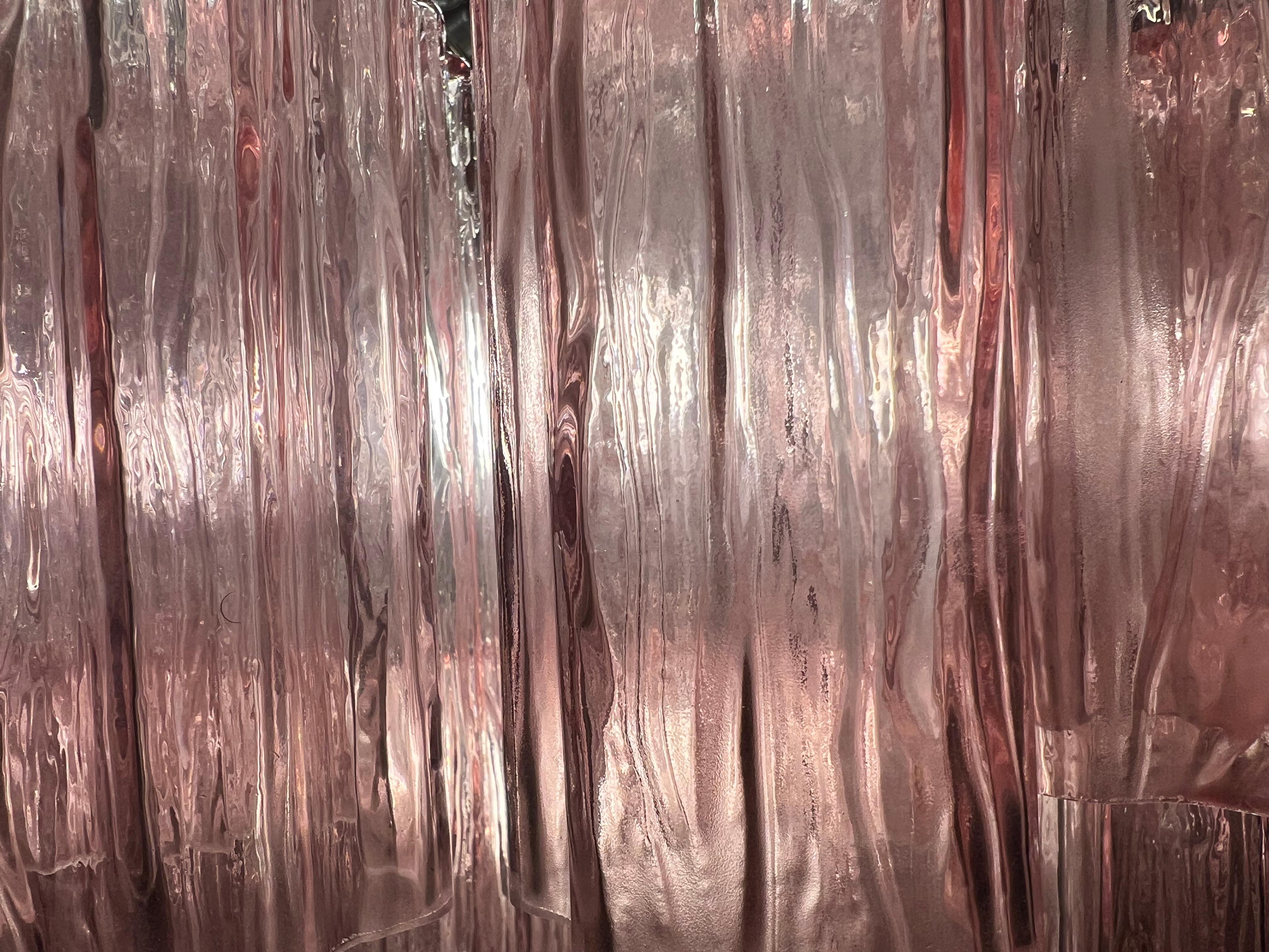 Italian vintage chandelier in Murano glass and nickel plated metal structure. The armor polished nickel supports 101 large pink glass tubes in a star shape. Can be used as a chandelier with chain, or as a ceiling light, the structure will be hung