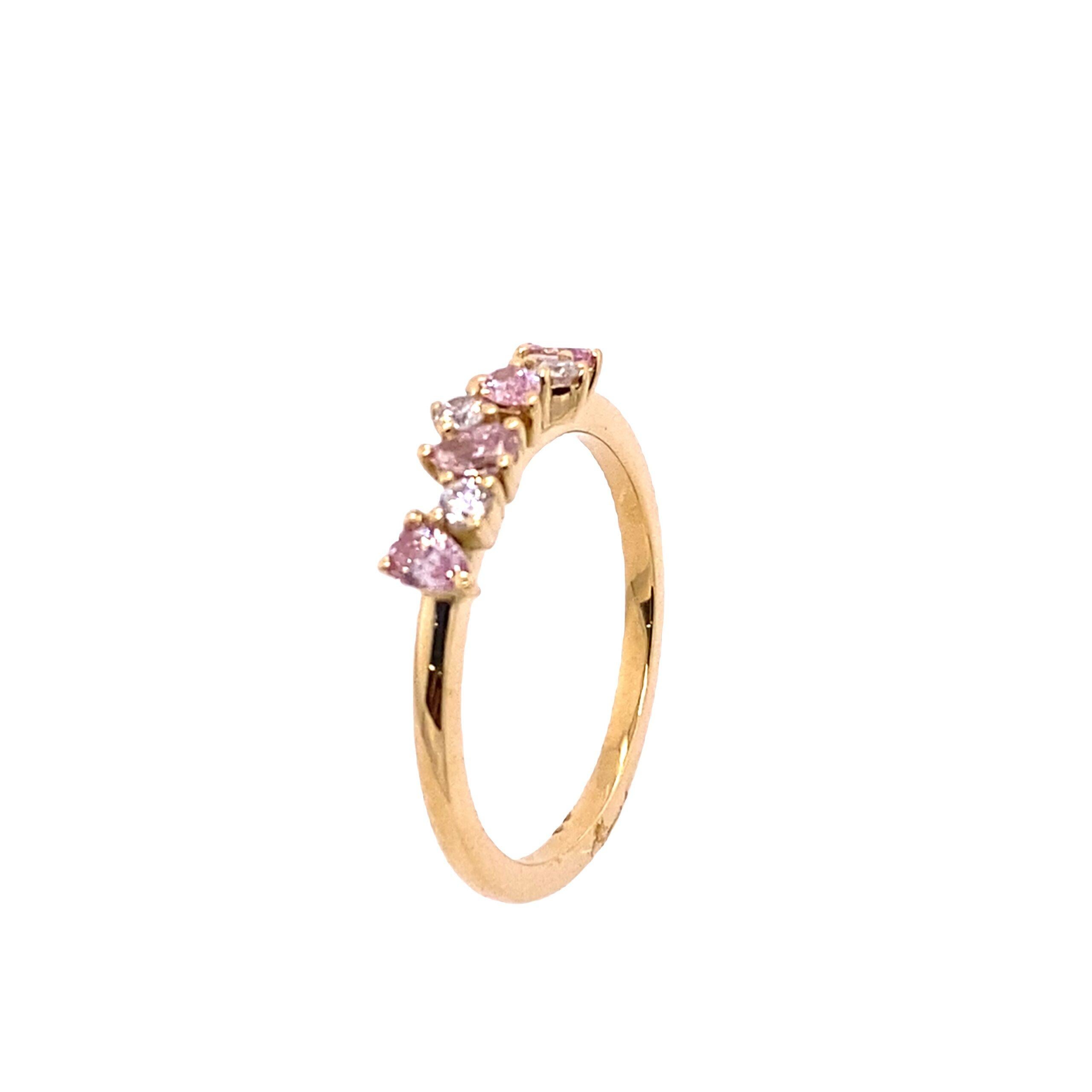 This magnificent natural intense pink pear shape and 3 round brilliant cut diamond ring is a simply gorgeous ring set in 18ct yellow gold.

Additional Information:
Total Diamond Weight: 0.43ct (0.32ct pink pear shape + 0.11ct round diamonds)
Diamond