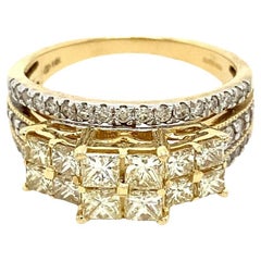 Magnificent Natural Yellow Diamond Princess Cut Trilogy Ring in 14ct Yellow Gold