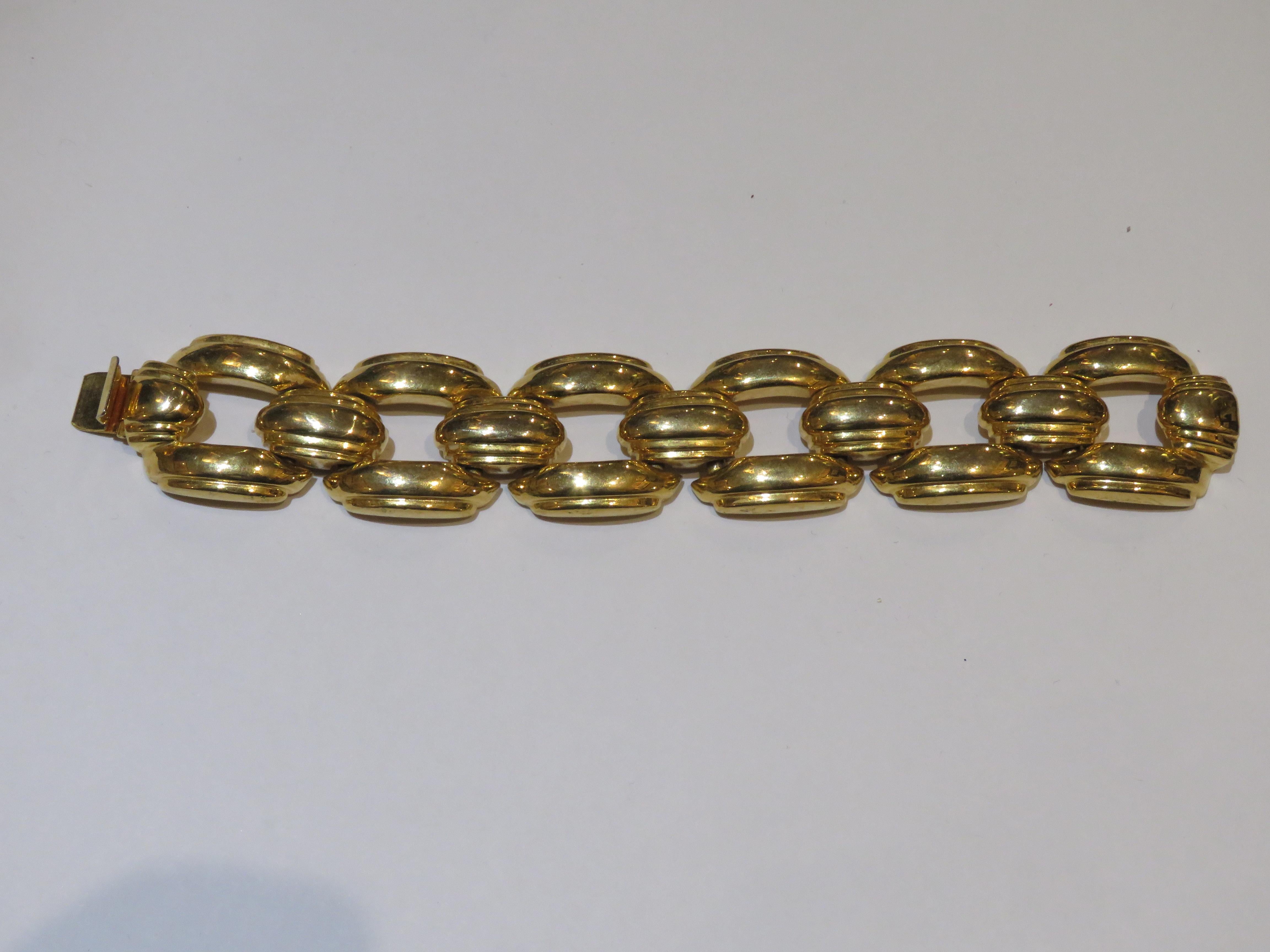 The Following Item we are offering is a Rare Important Radiant 18KT Overlaid Gold Link Bracelet. This Gorgeous Piece is a Vintage Piece and has Magnificent Interwined Chain links and is heavy.  Circa 1980s. Taken out of an Important Several Million