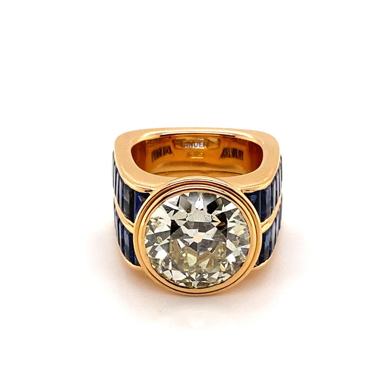 Well played fusion of an antique diamond with a modern design. Binder Zurich is a well know name for collectors all over the world. 

The 7.21 ct old European cut diamond of approximate O/P colour and si2 clarity is embedded in a fine double bezel