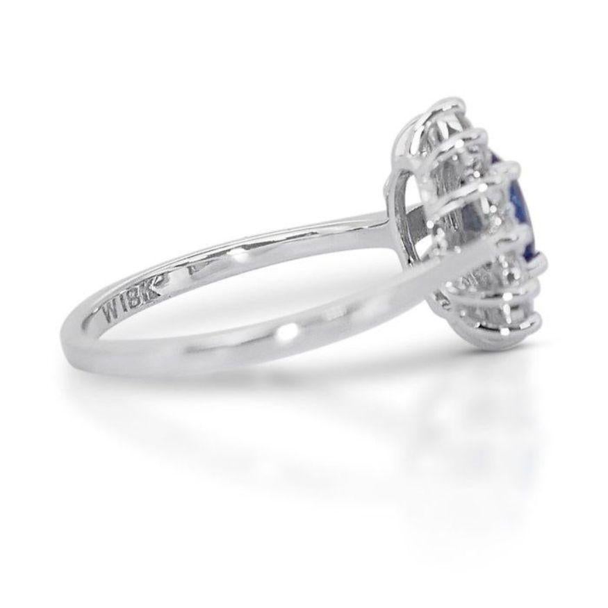 Magnificent Oval Brilliant Sapphire Ring with Side Diamonds in 18K White Gold  For Sale 1
