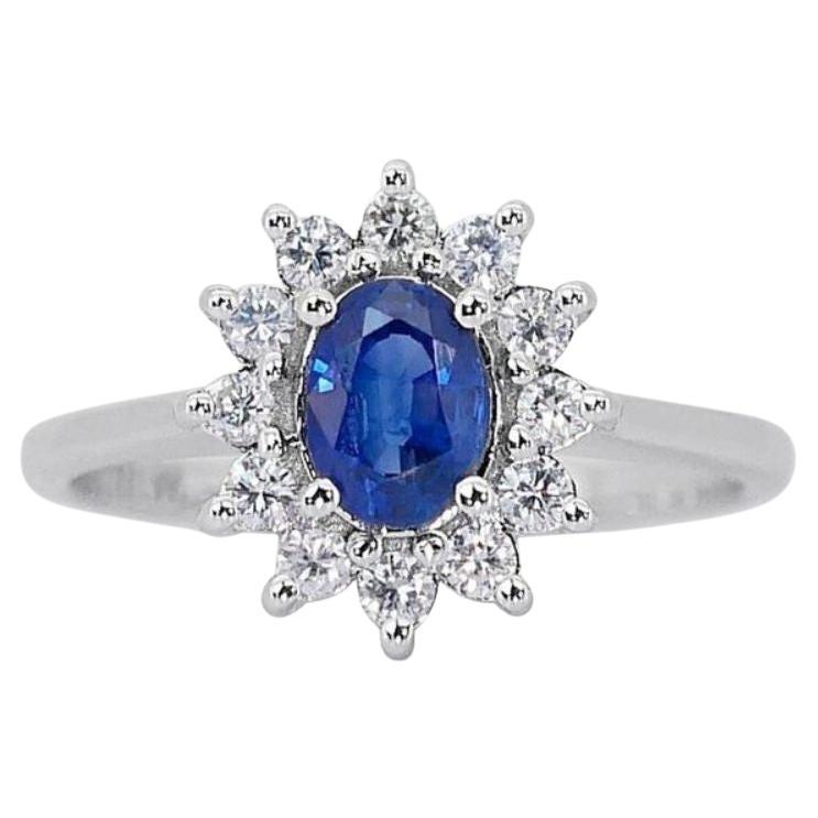 Magnificent Oval Brilliant Sapphire Ring with Side Diamonds in 18K White Gold  For Sale