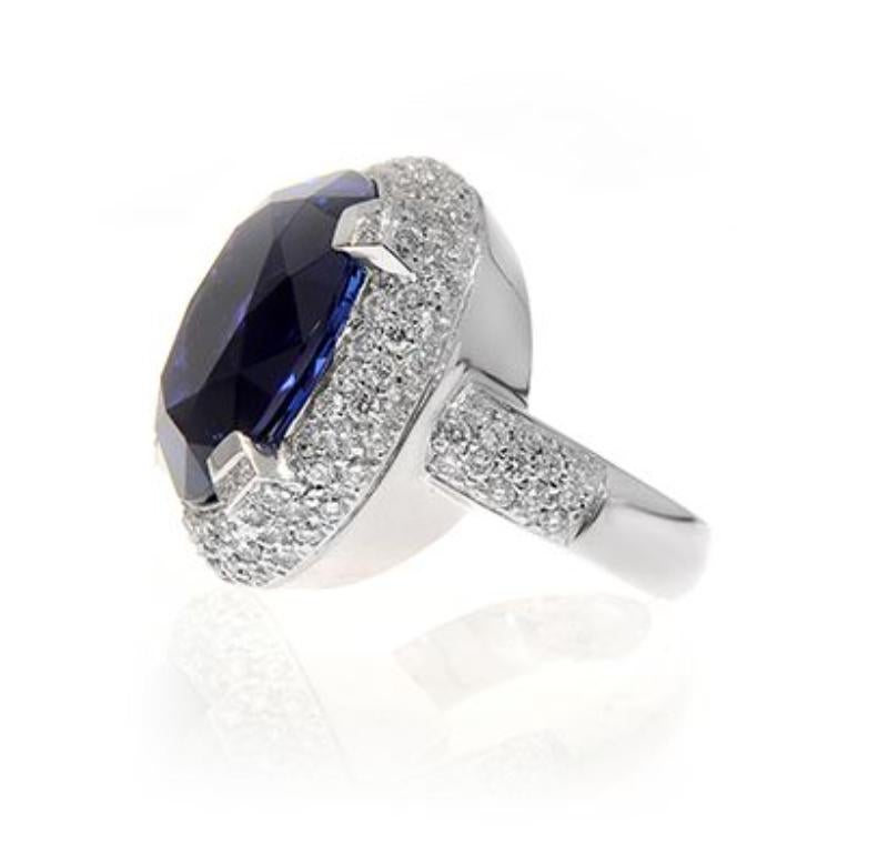 18k White Gold 24.5ct Oval Tanzanite and 2.29ct Diamond Ring

The remarkable brilliance of this top quality Tanzanite shines in a
tremendous diamond ring.
Item: # 01616
Metal: 18k W
Color Weight: 24.50 ct.
Diamond Weight: 2.29 ct.