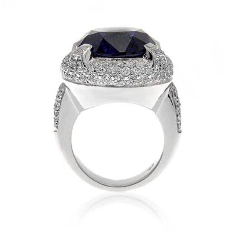 Modern 18k White Gold 24.5ct Oval Tanzanite and 2.29ct Diamond Ring For Sale