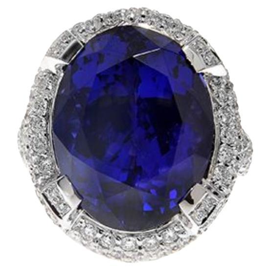 18k White Gold 24.5ct Oval Tanzanite and 2.29ct Diamond Ring For Sale