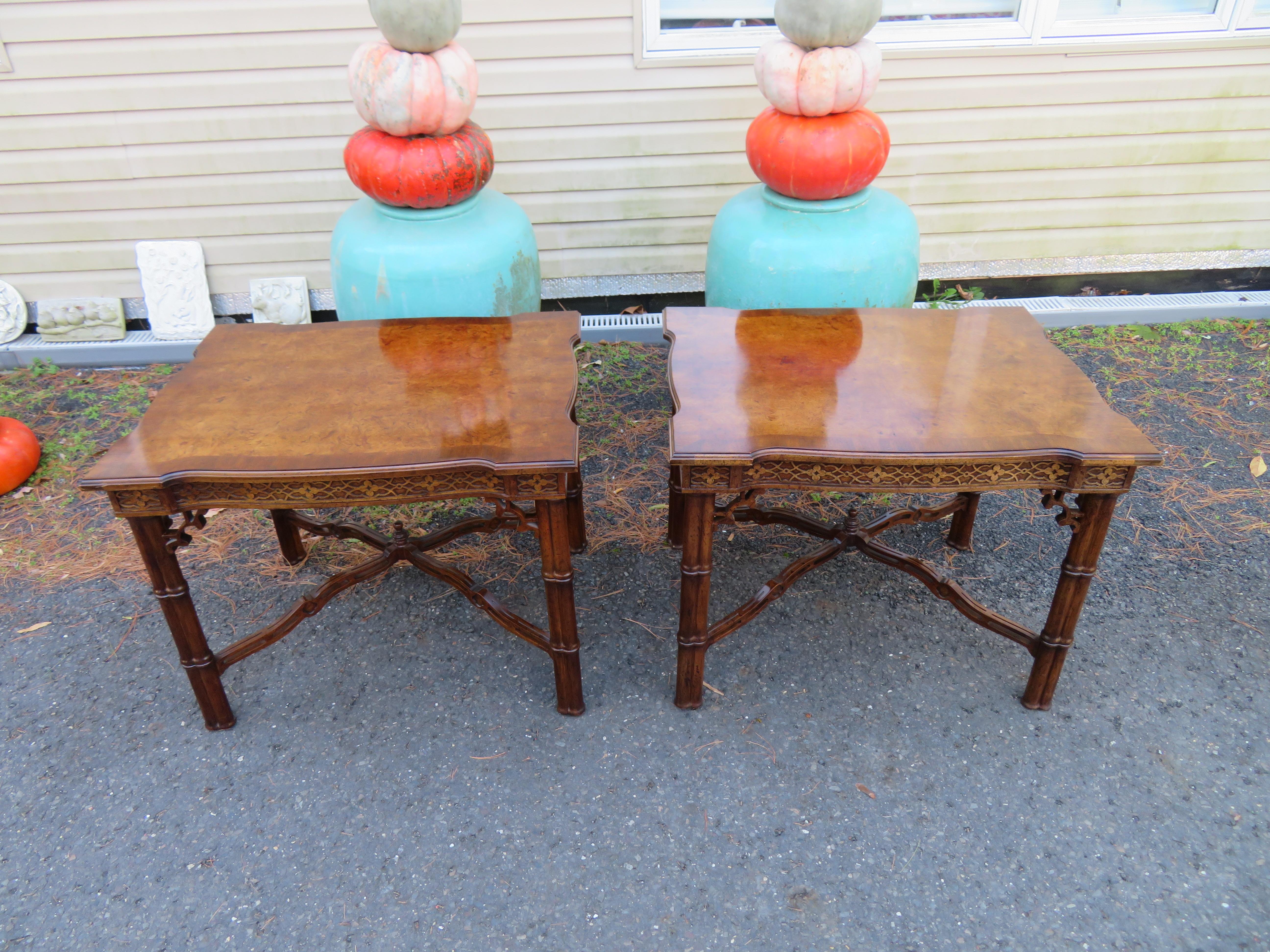 Magnificent pair of burl top Chinoiserie faux bamboo end tables. These tables are in wonderful vintage condition with only light signs of age. They measure 25