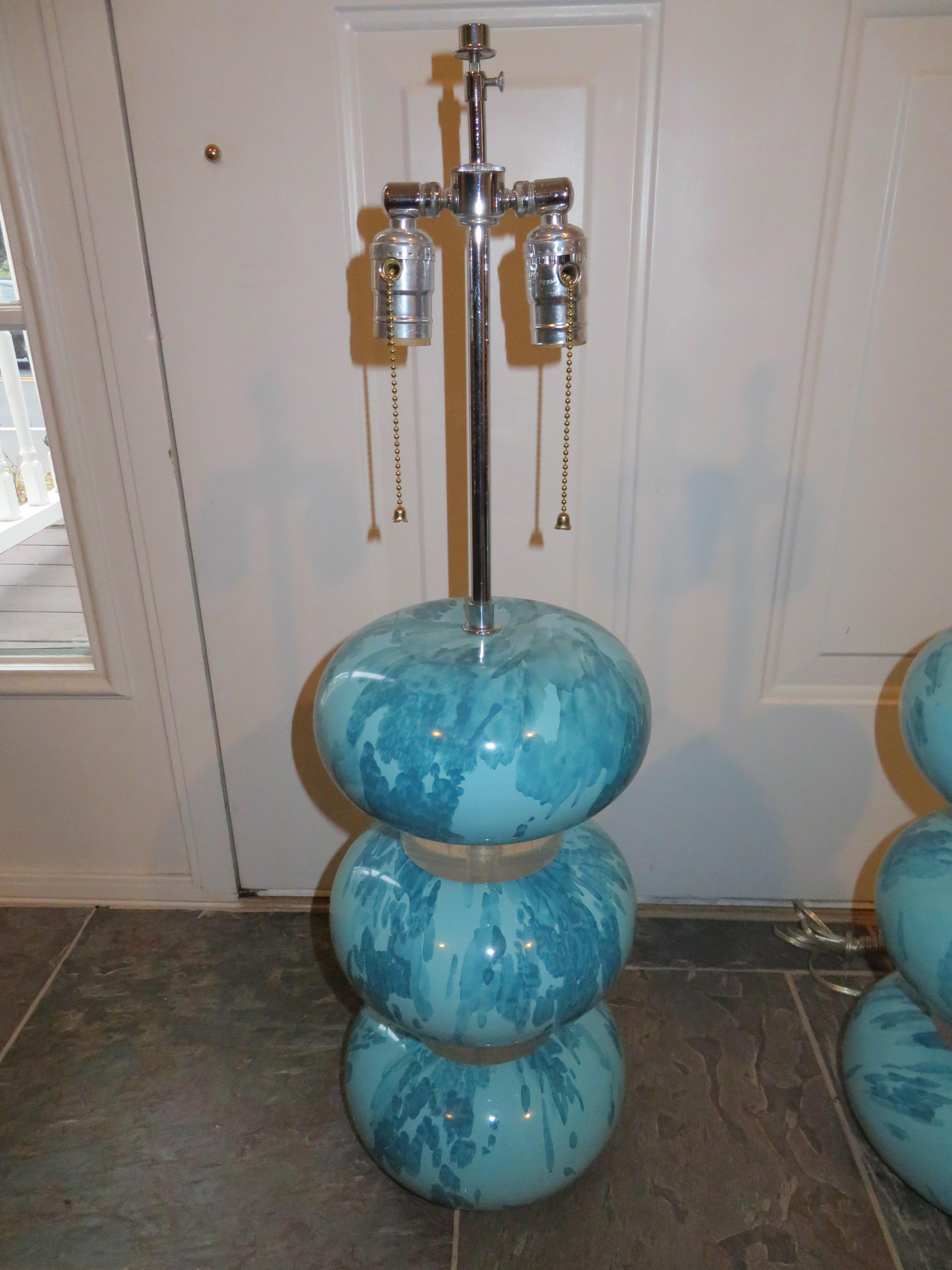 Magnificent and rare pair of Karl Springer marbleized blue lacquer and Lucite bubble table lamps, USA, 1970s. Retains Springer's original marbleized blue lacquered finish over three rounded plaster compressed spheres separated by two Lucite spacers.
