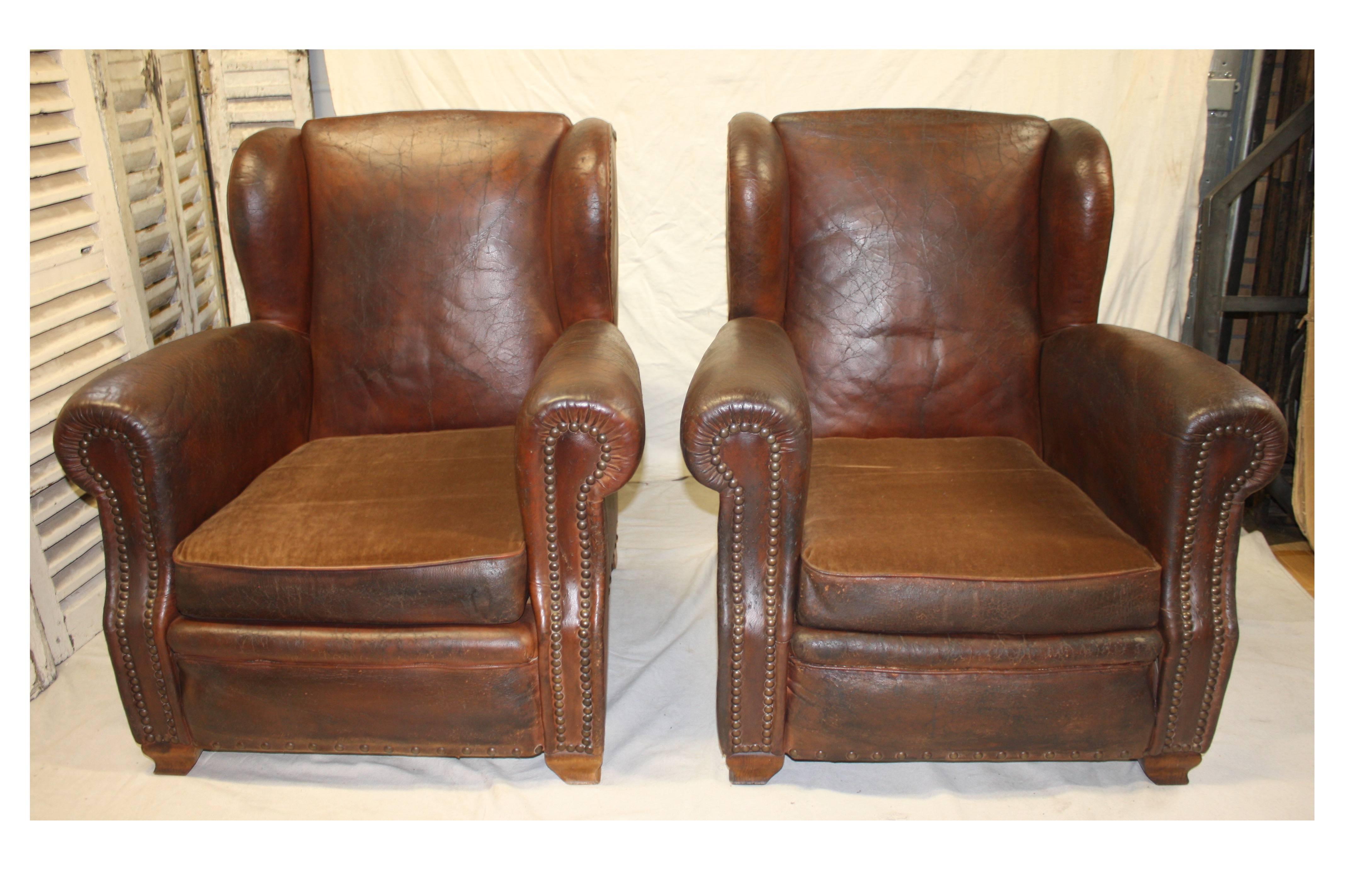 Magnificent pair of 19th century French club chairs.