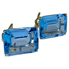 Magnificent Pair of 40.00 Ct Emerald Cut Blue Topaz Yellow Gold Clip on Earrings