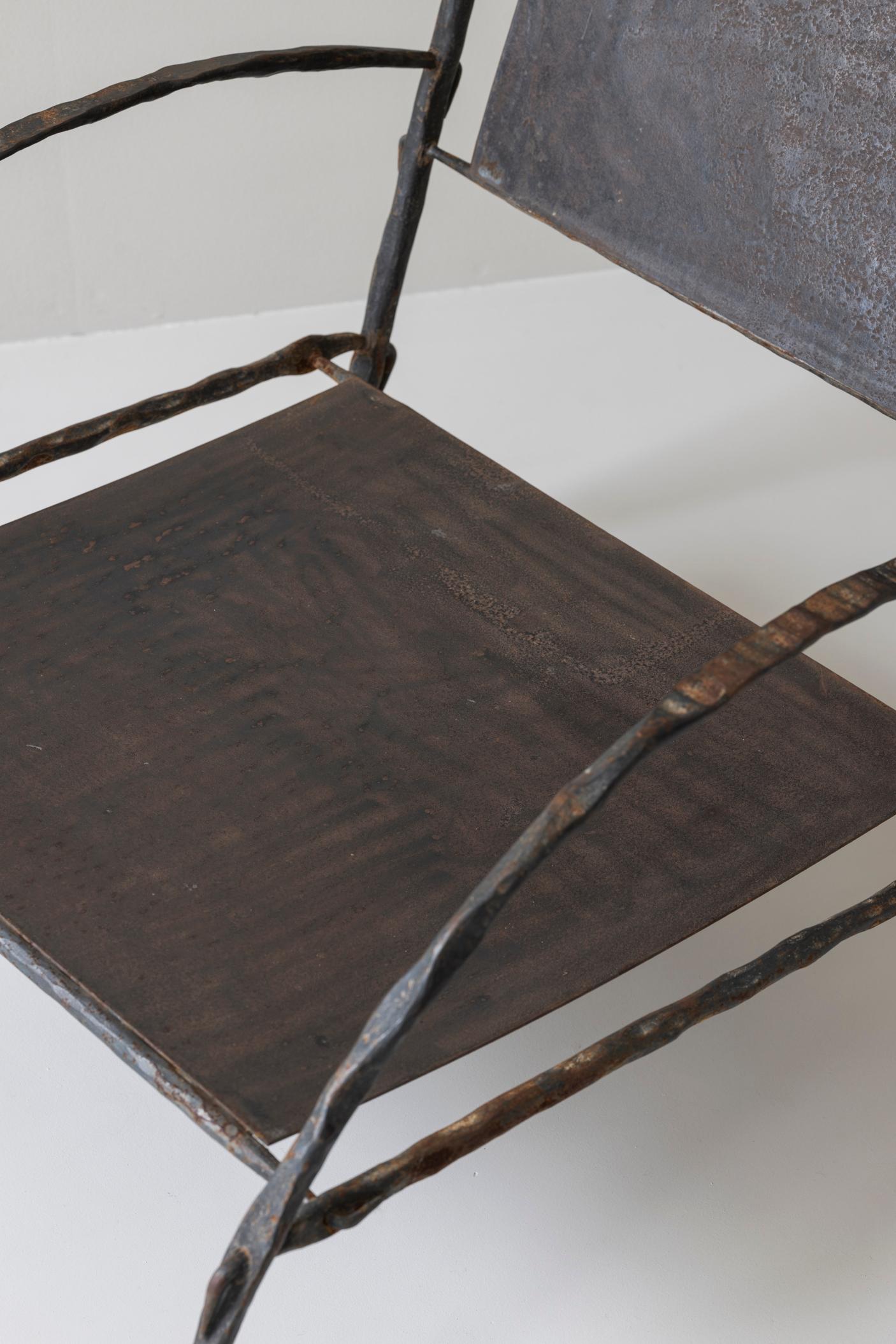 Wrought Iron Magnificent pair of easy chairs, 1930s, in the manner of Diego Giacometti.
