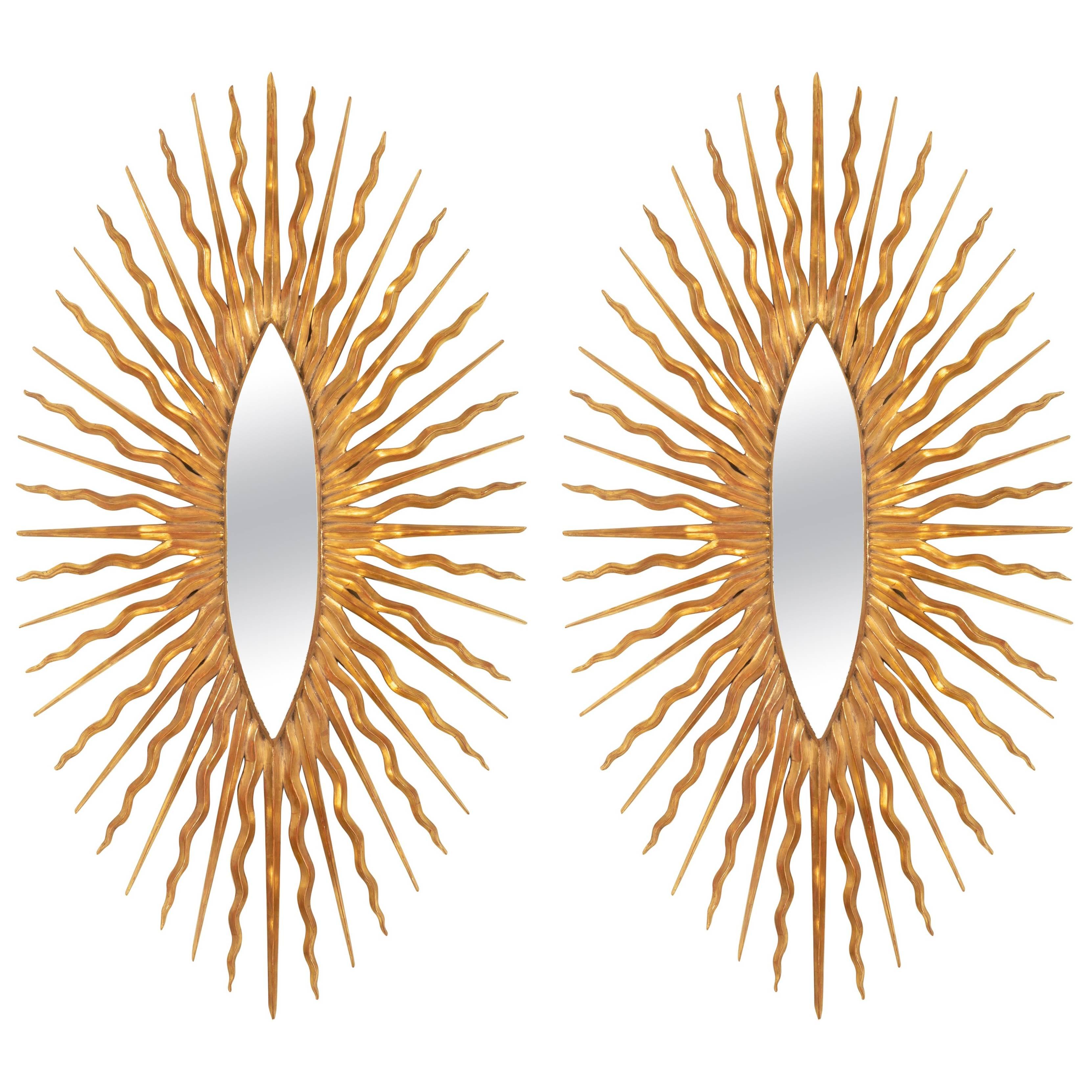 Magnificent Pair of Italian Sunburst Carved and Gilt Mirrors