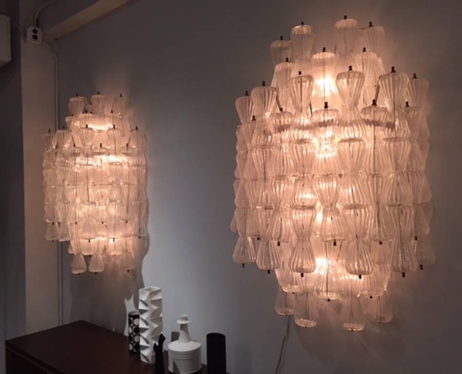 A very rare and unique pair of Italian large hour glass piece sconces by famous glass house Barovier & Toso, circa 1960. The design is called 