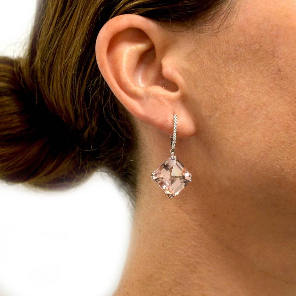 29.71 carats of morganite square  drop earrings set in platinum. With approximately .25 carats of diamonds. 