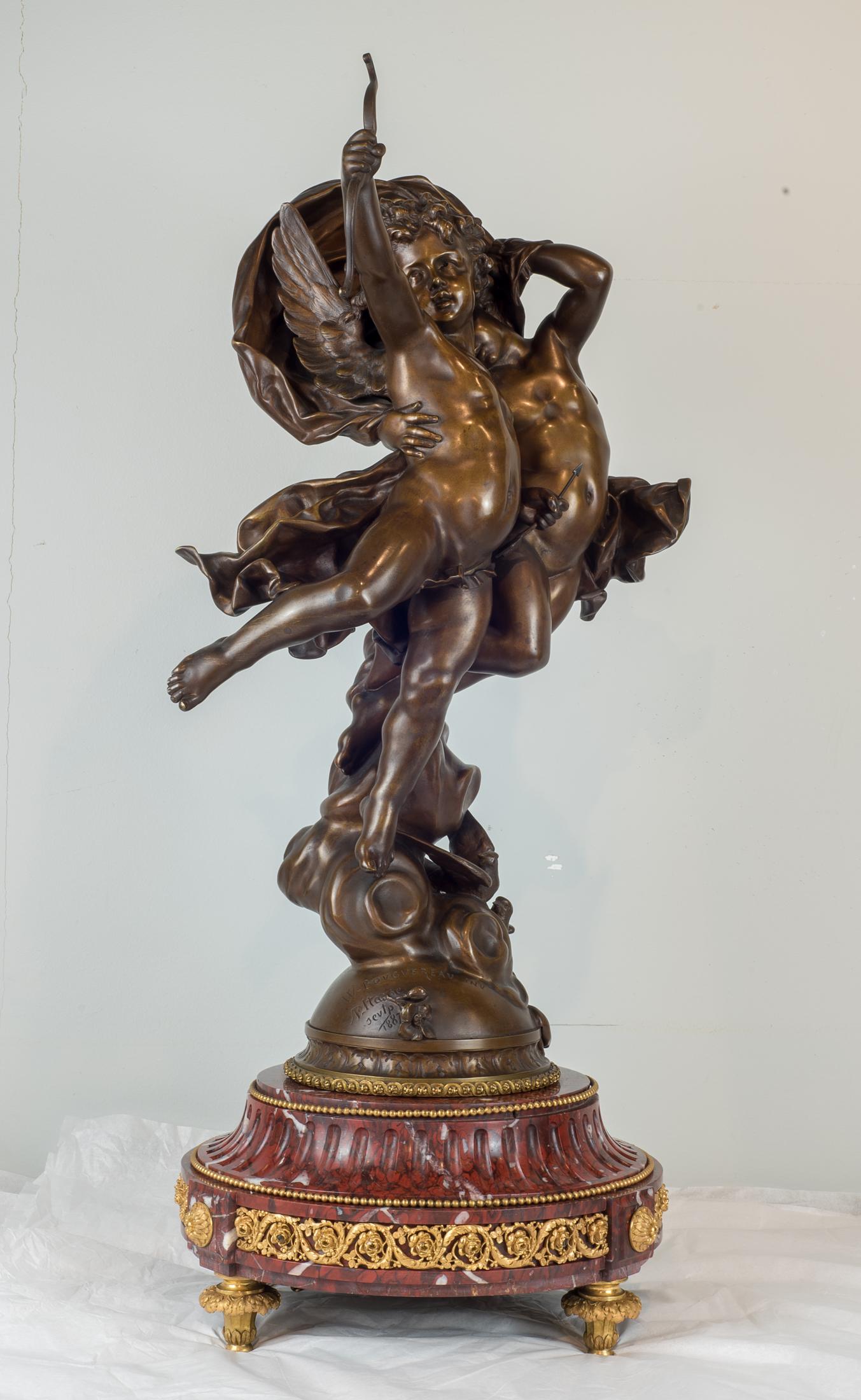 A magnificent French patinated bronze sculpture of cupid and psyche is entitled 