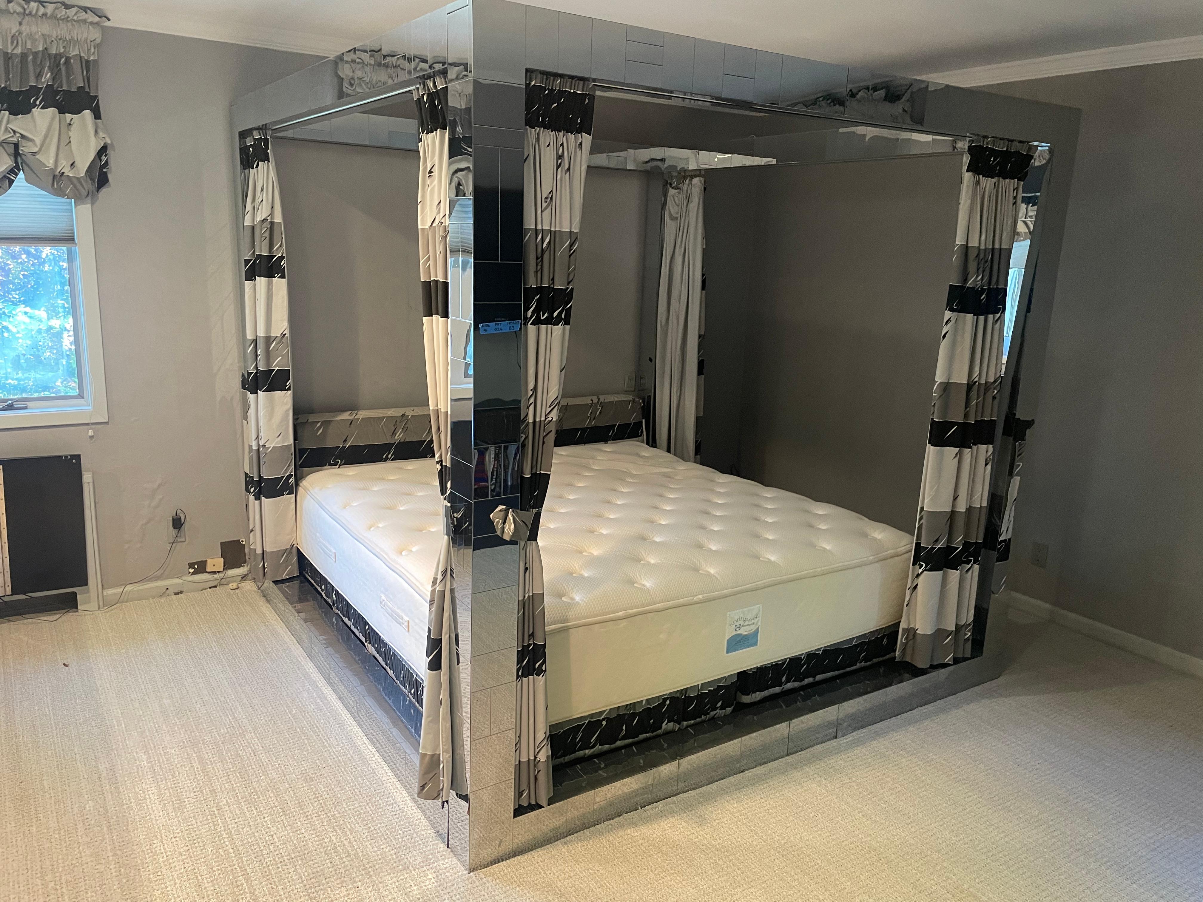 A Magnificent Paul Evans Cityscape four-poster canopy king-size bed in polished chrome patchwork.
interior measurements 82