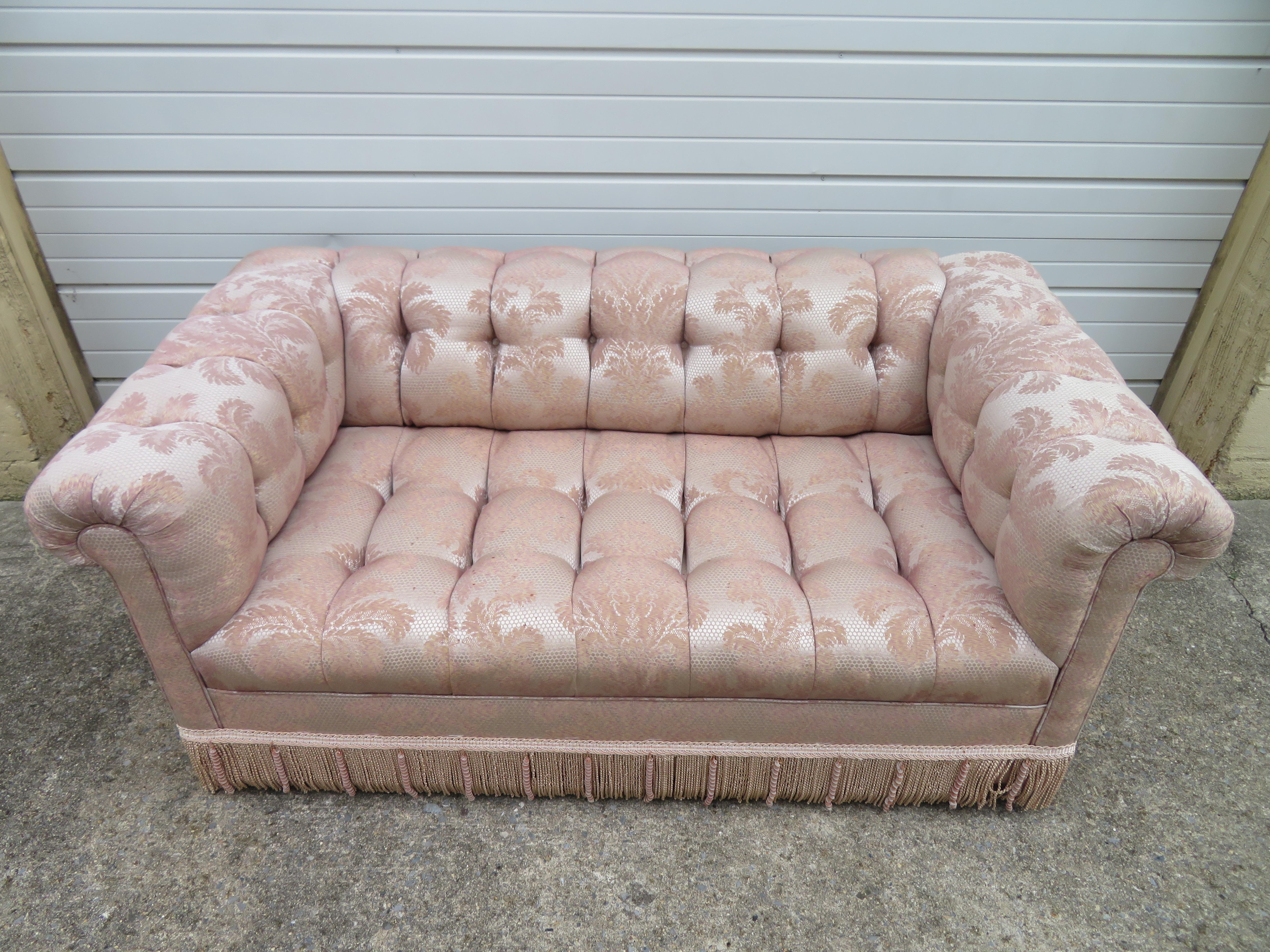 Magnificent Milo Baughman style Directional biscuit tufted party loveseat sofa. This sofa was re-upholstered about 15 years ago and would be best redone again-light wear to seat and arms. This piece measures 27