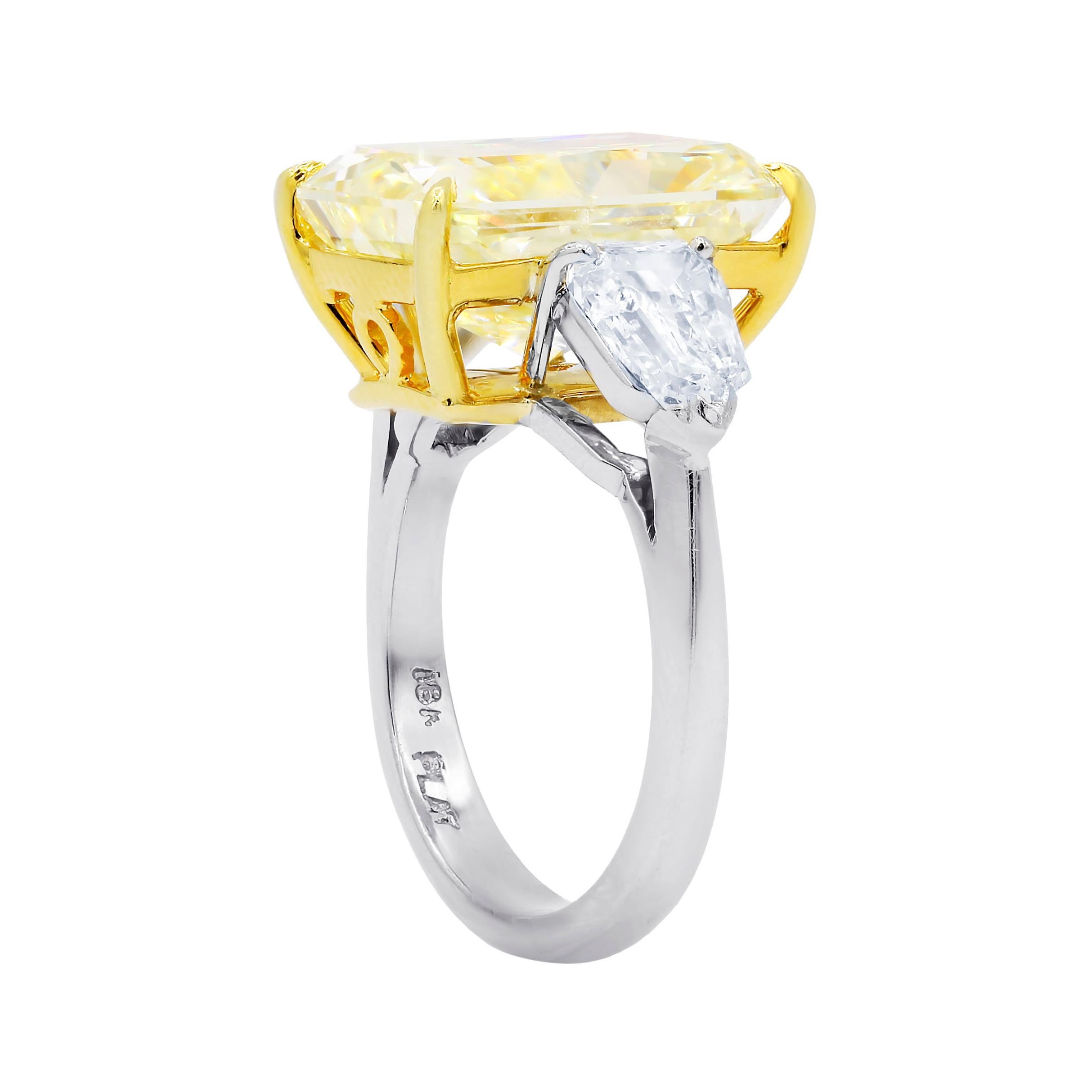 Magnificent platinum and 18kt fancy diamond ring with radiant cut 10.15ct fancy yellow si2 (radc1053)and  1.80cts of bullets 
