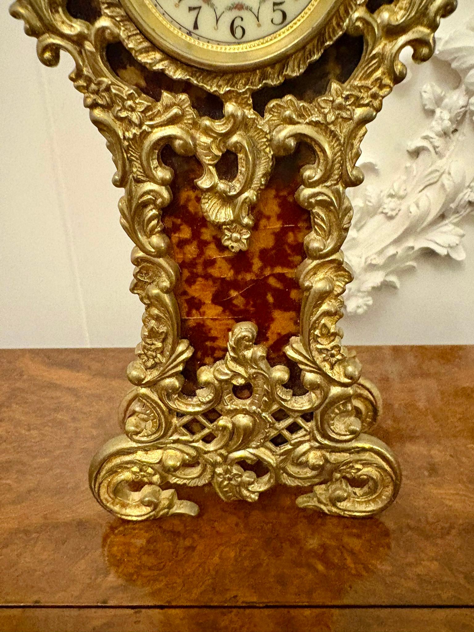 Magnificent quality antique Edwardian ornate gilded brass miniature longcase clock having a beautiful and quality ornate gilded brass case with a circular porcelain dial with original hands 8 day French movement 

A divine piece in lovely condition