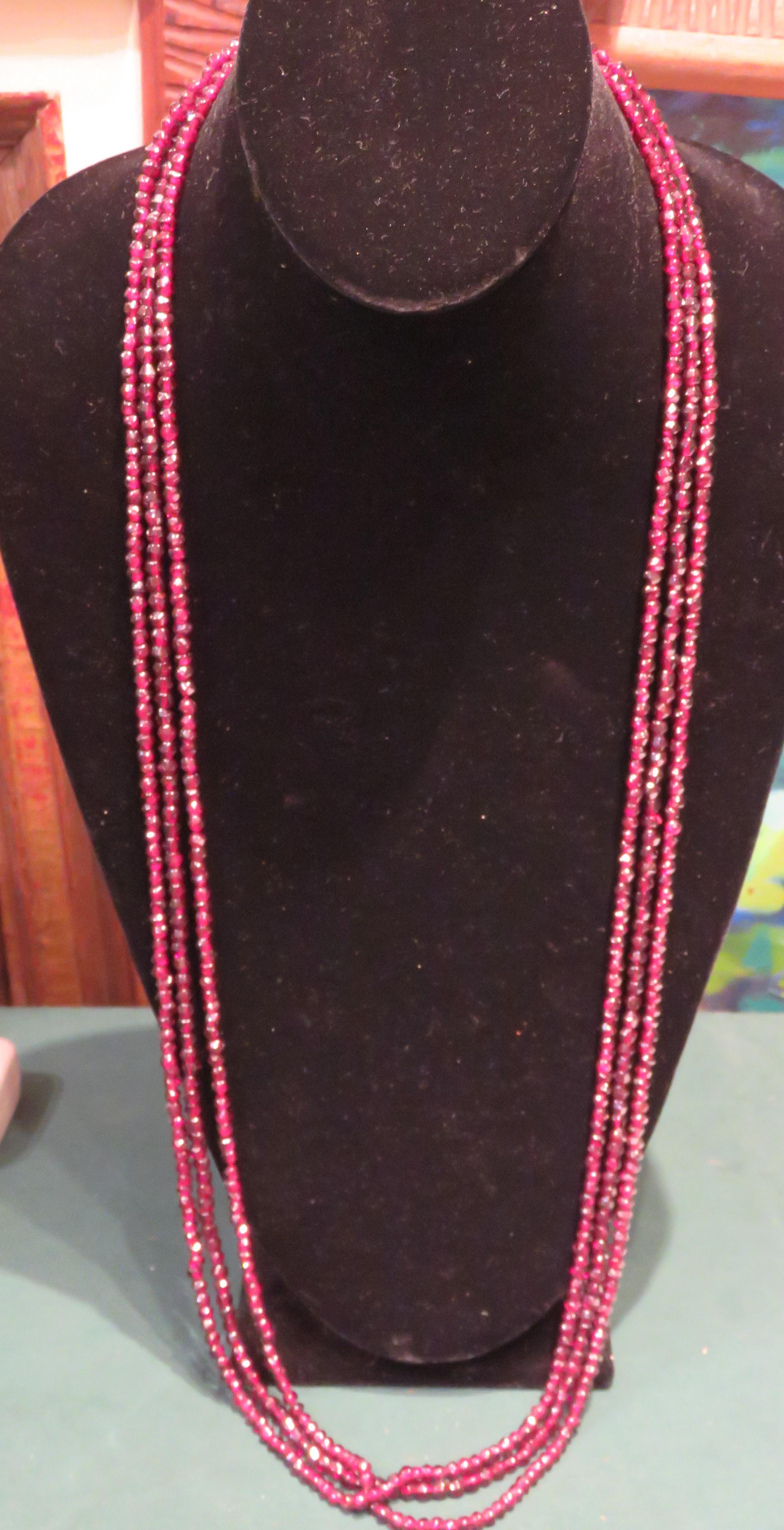 The Following Item we are offering are these Three Rare Important Radiant Faceted Red Garnet Long Strand Necklaces. These Necklaces have 3 Magnificent Rare Round Cut Glittering Garnets and each strand measures approx 35