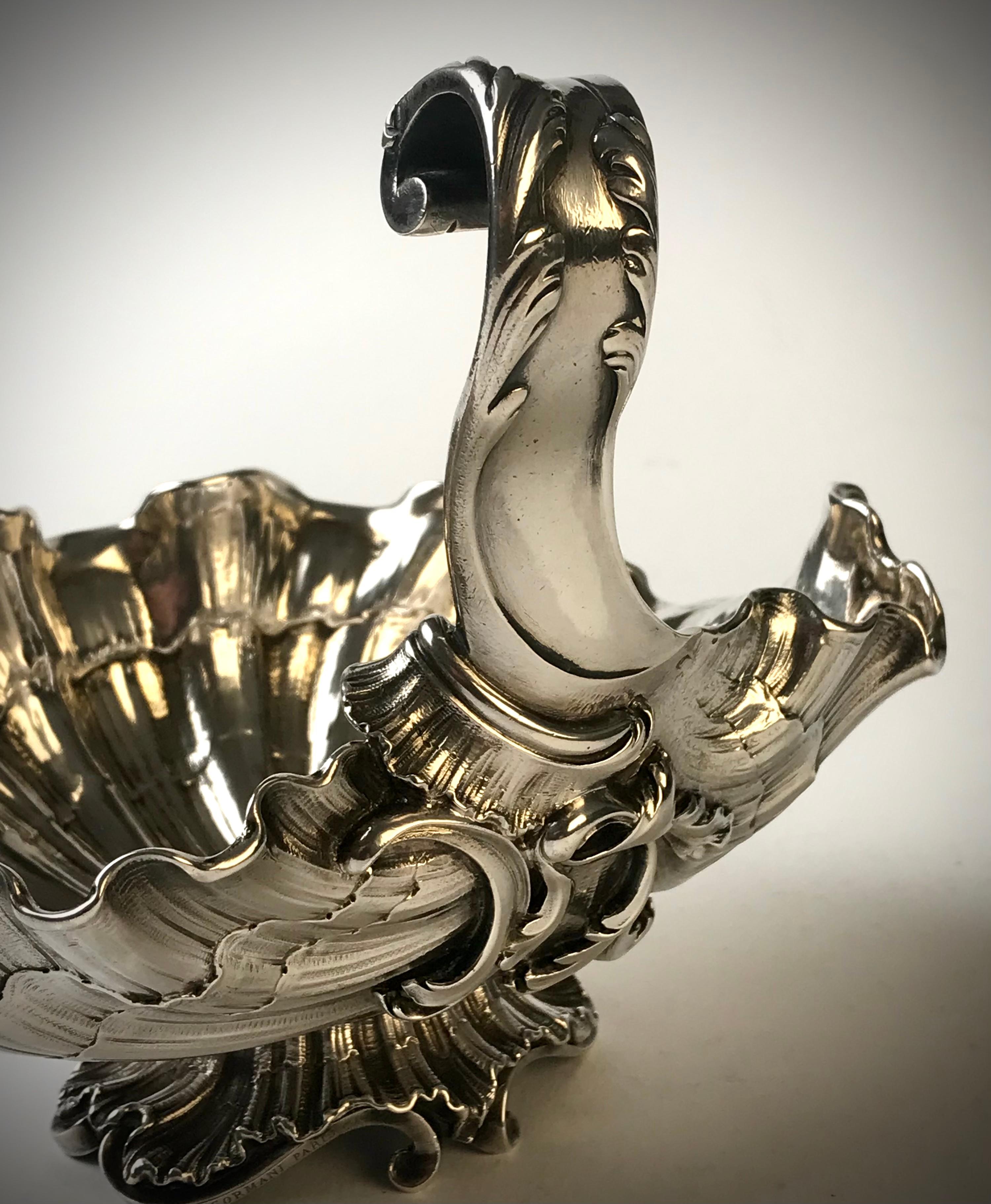 Magnificent Solid Silver sauce boat in the shape of a shell
Exquisite workmanship and finely detailed piece with beautifully flowing lines
Rarely seen silver by this famous creator 
Weight 353 grams 
Length 18cm 
Width 2 cm 
Height 14
Circa