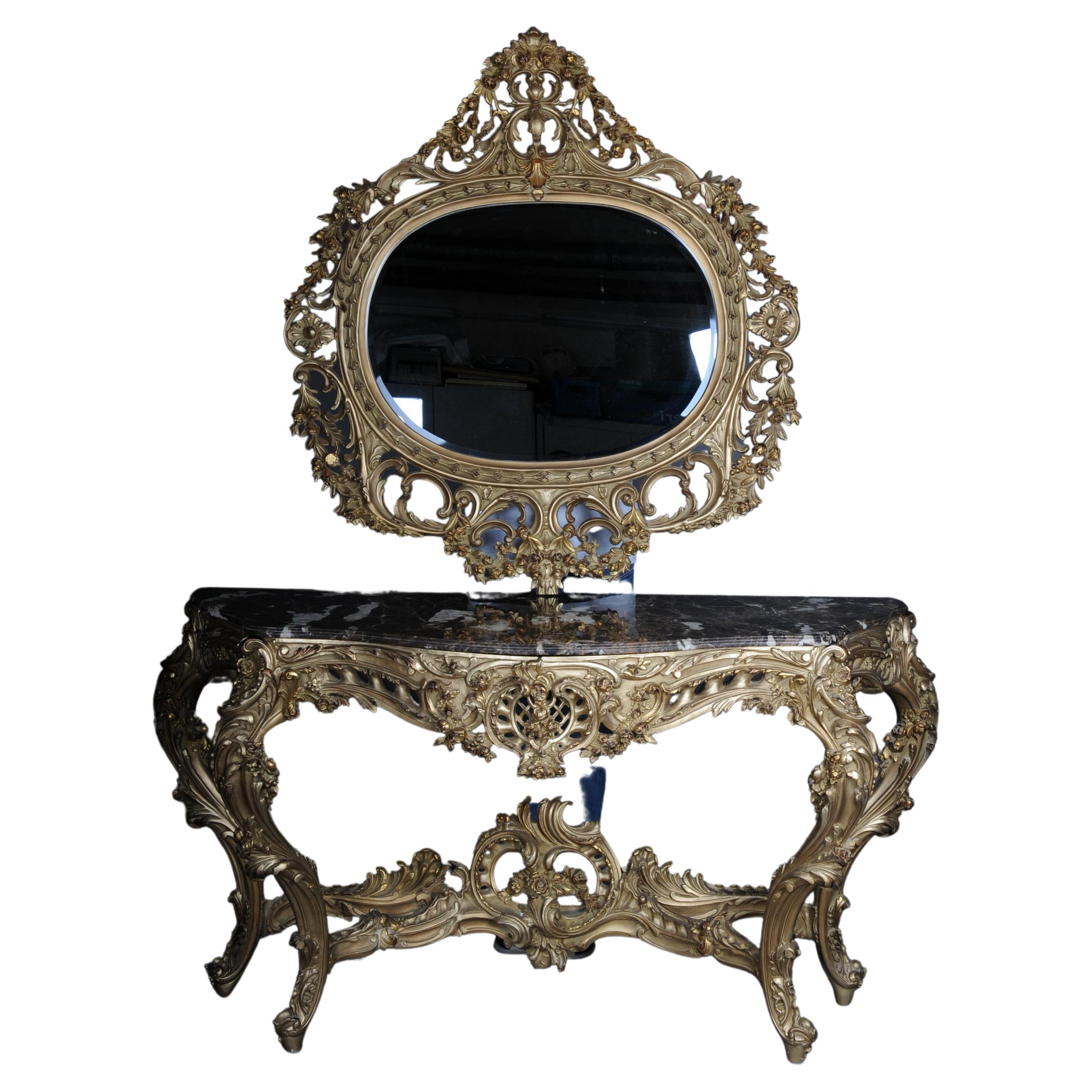 Magnificent Rococo mirror console/sideboard, gold beech wood, gilt.

Impressive and richly carved wall console made of solid beech wood, hand-carved and gilded. Very high quality decorated with massive rococo elements. No stucco or gibberish! All