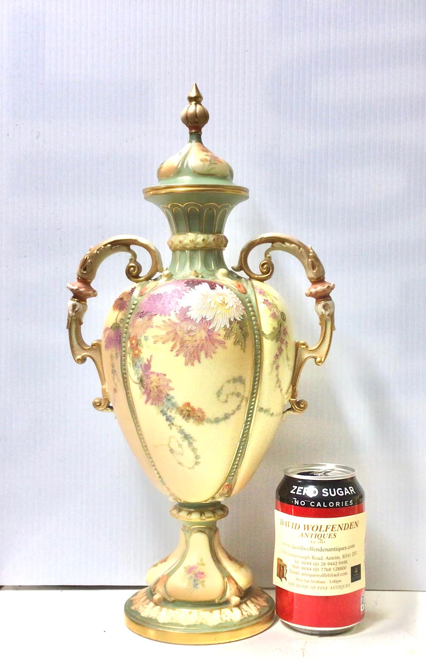 Magnificent large antique Royal Worcester blush ivory vase with cover hand painted with flowers and foliage.
Dated puce mark 1901
Measures: 16ins x 8ins x 5.5ins deep
(41cm x 20cm x 14cm deep).