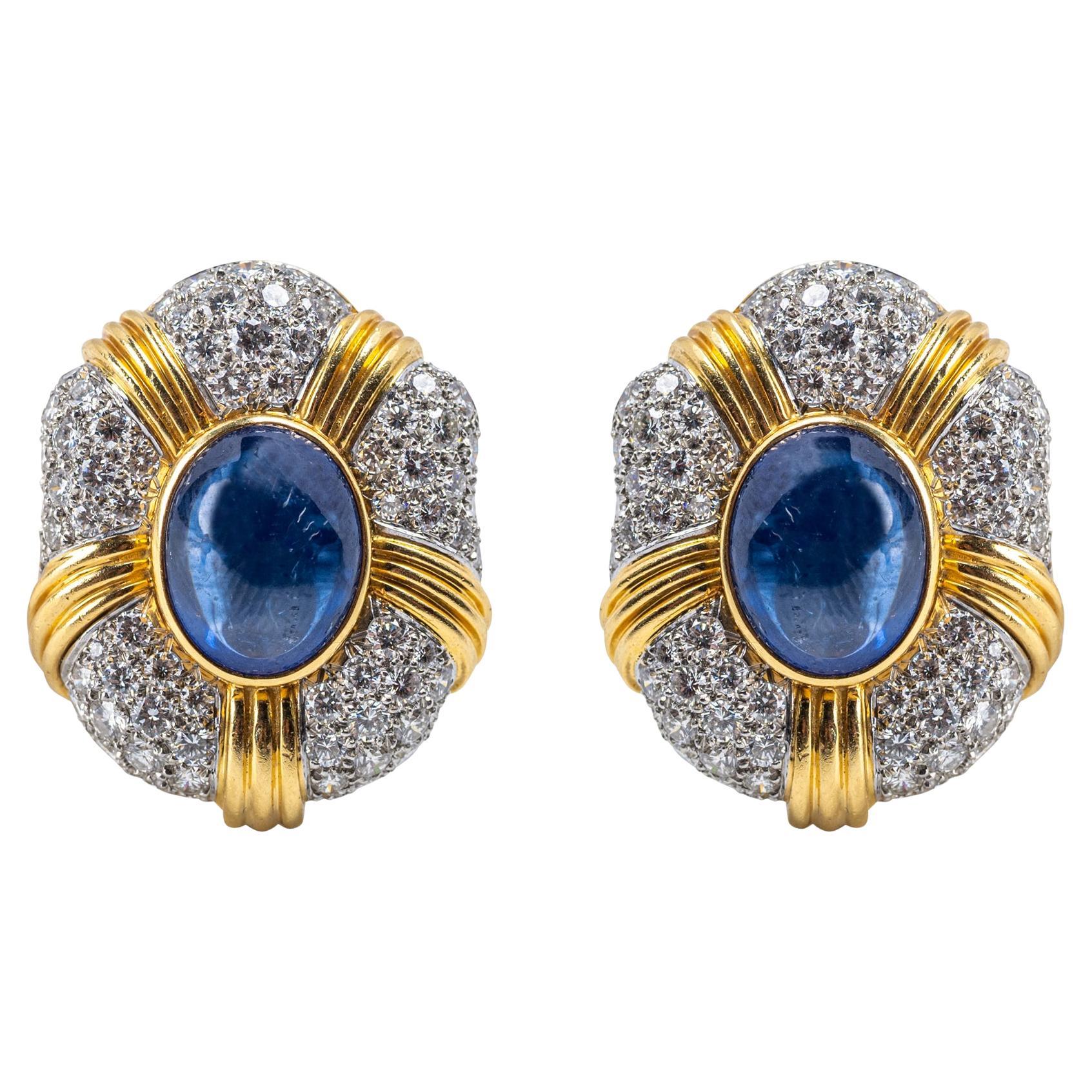 Magnifici fermi per orecchie con zaffiri e diamanti in oro 18 carati