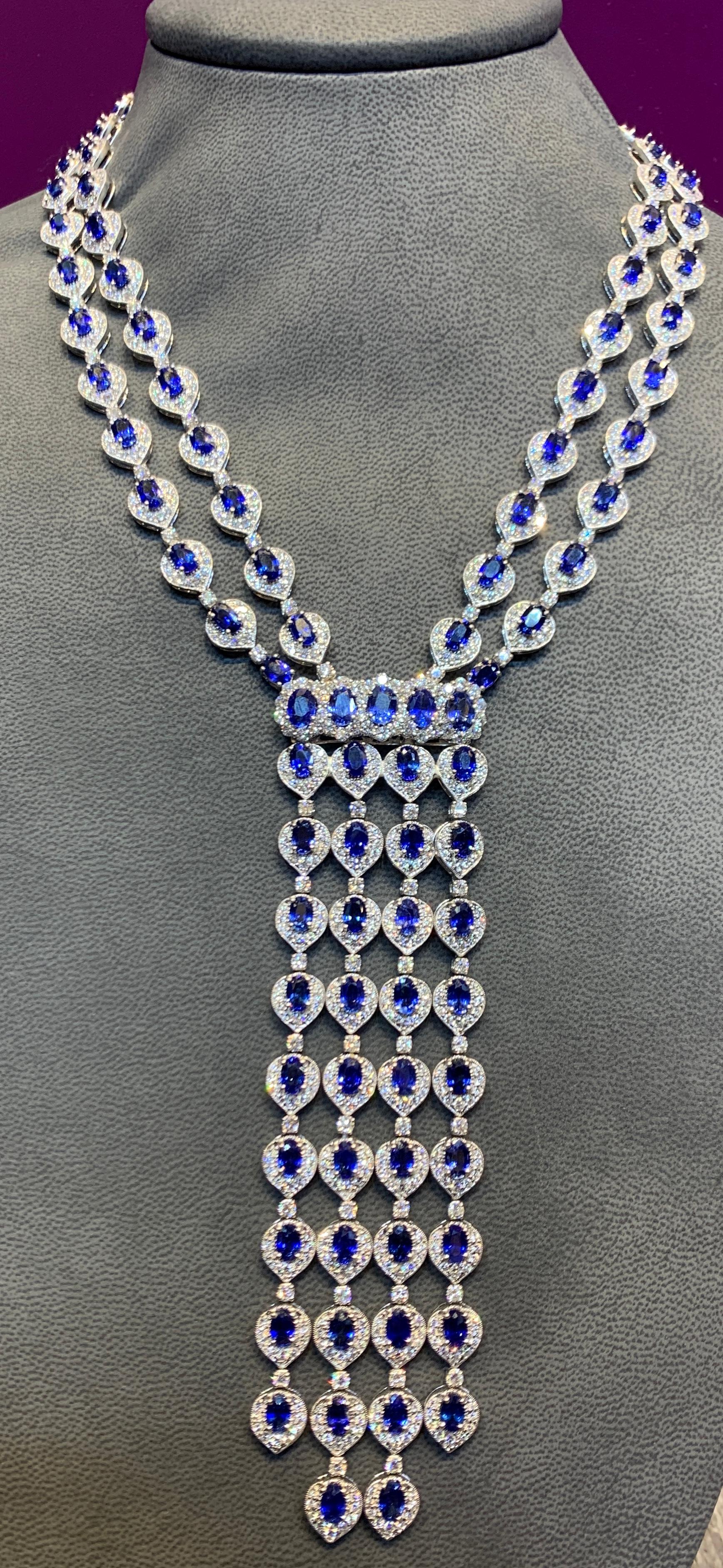 Magnificent Sapphire and Diamond Tassel Necklace

Approximately 77 carats of oval cut sapphires & 28 carats of round cut diamonds all set in platinum. 

Measurements: inner tassels: 5