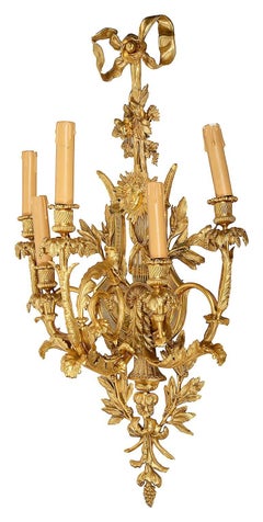 Magnificent set of six Louis XVI style gilded ormolu wall sconces.