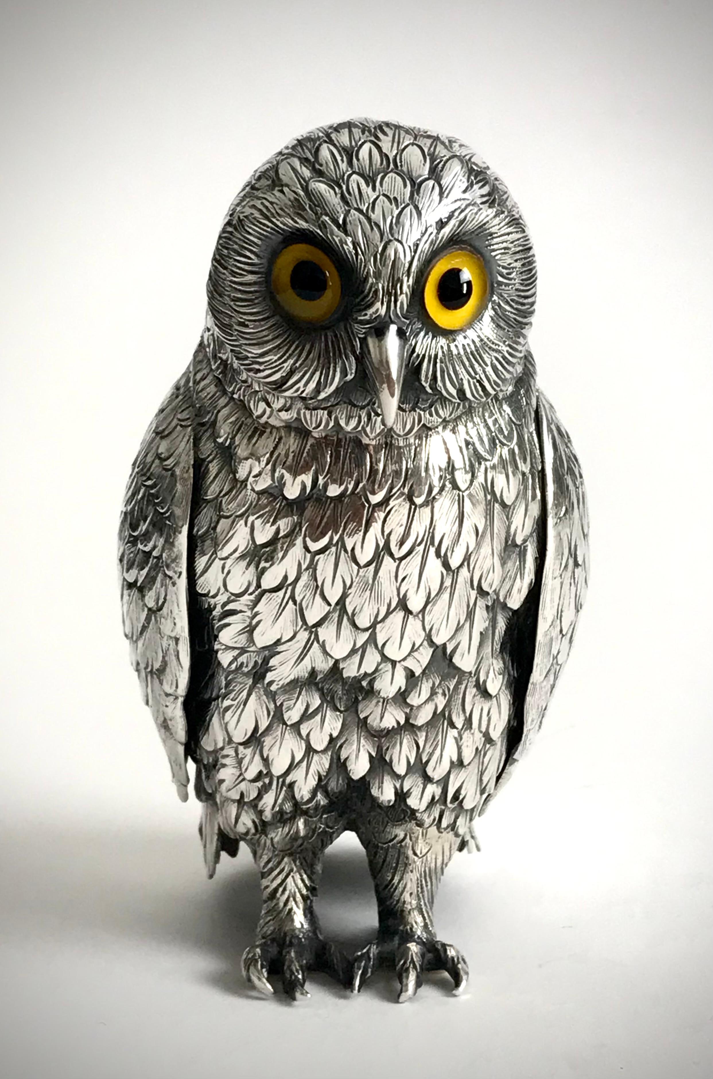 A magnificent, rare realistic Solid Silver Sterling table Owl with wonderful detailing to the feathers and feet in very good condition.
He has 2 glass eyes which are also in very good condition, with no grazing of scratching.
Hallmarked to the base