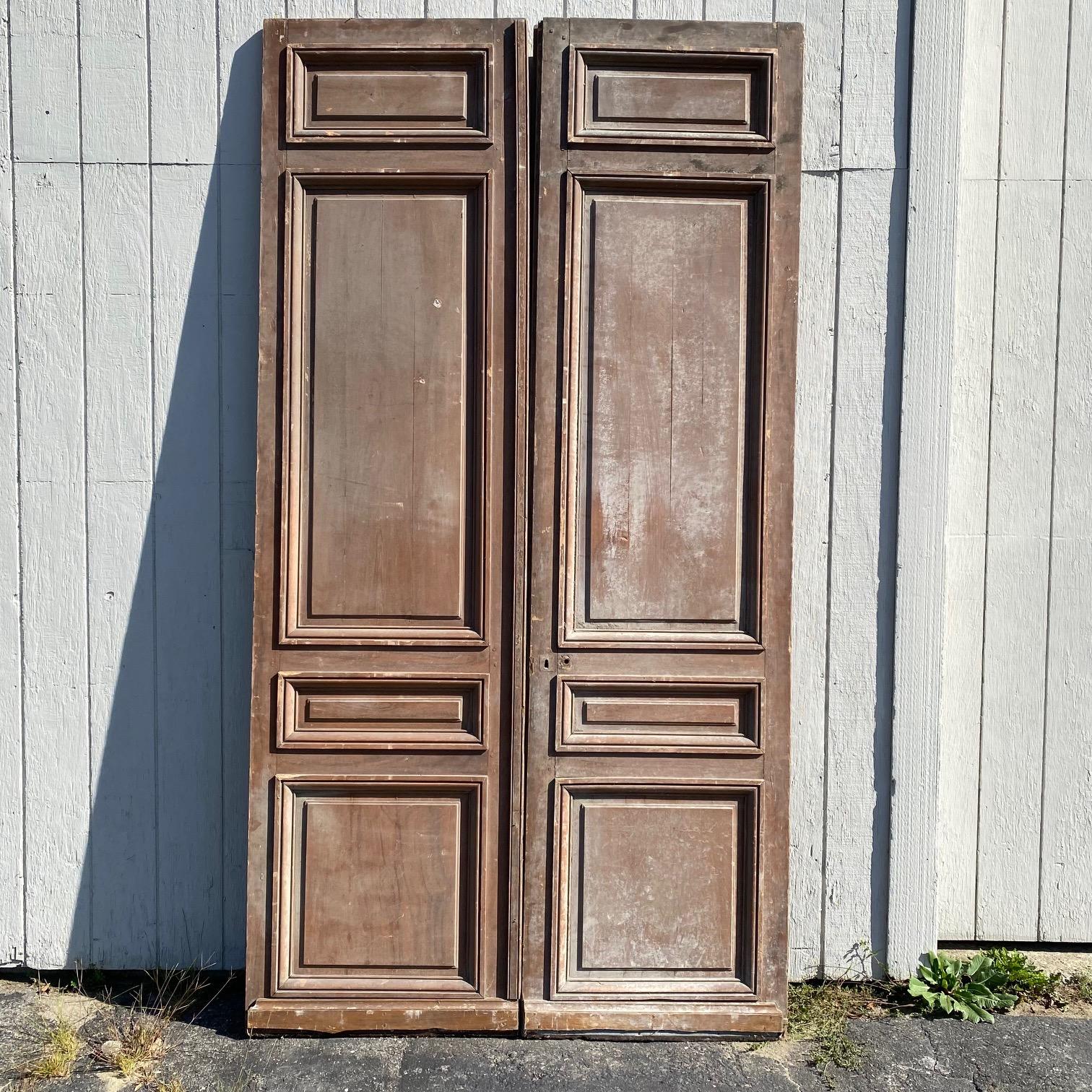 A stunning pair of early majestic French doors; solid paneled frame construction with 4 panels each. Taken from an important chateau in France, these doors will add importance and elegance to any home! Bought in Avignon, France.
#6131
Each panel