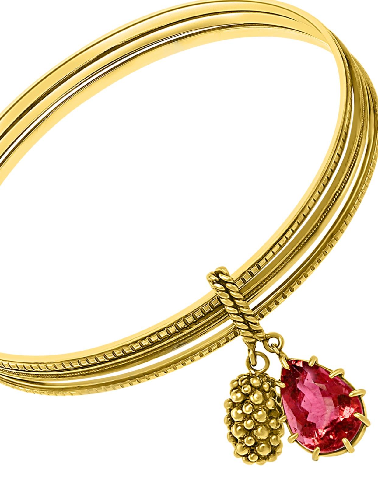 gold bangle with charm