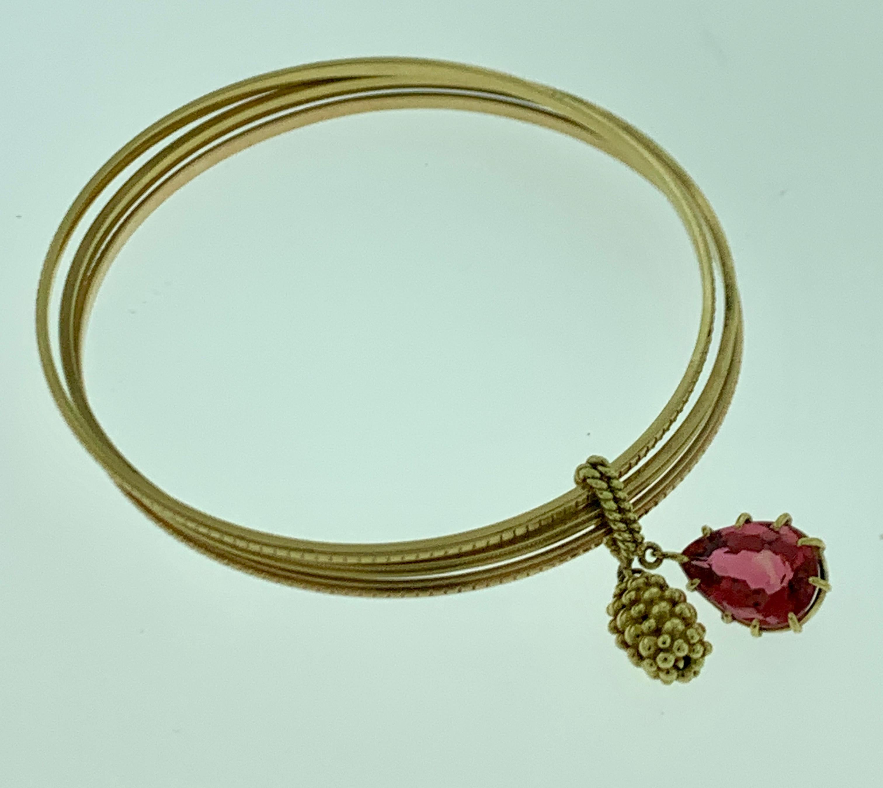 Magnificent Three Yellow Gold Bangle Attached by Pink Tourmaline and Gold Charm 2