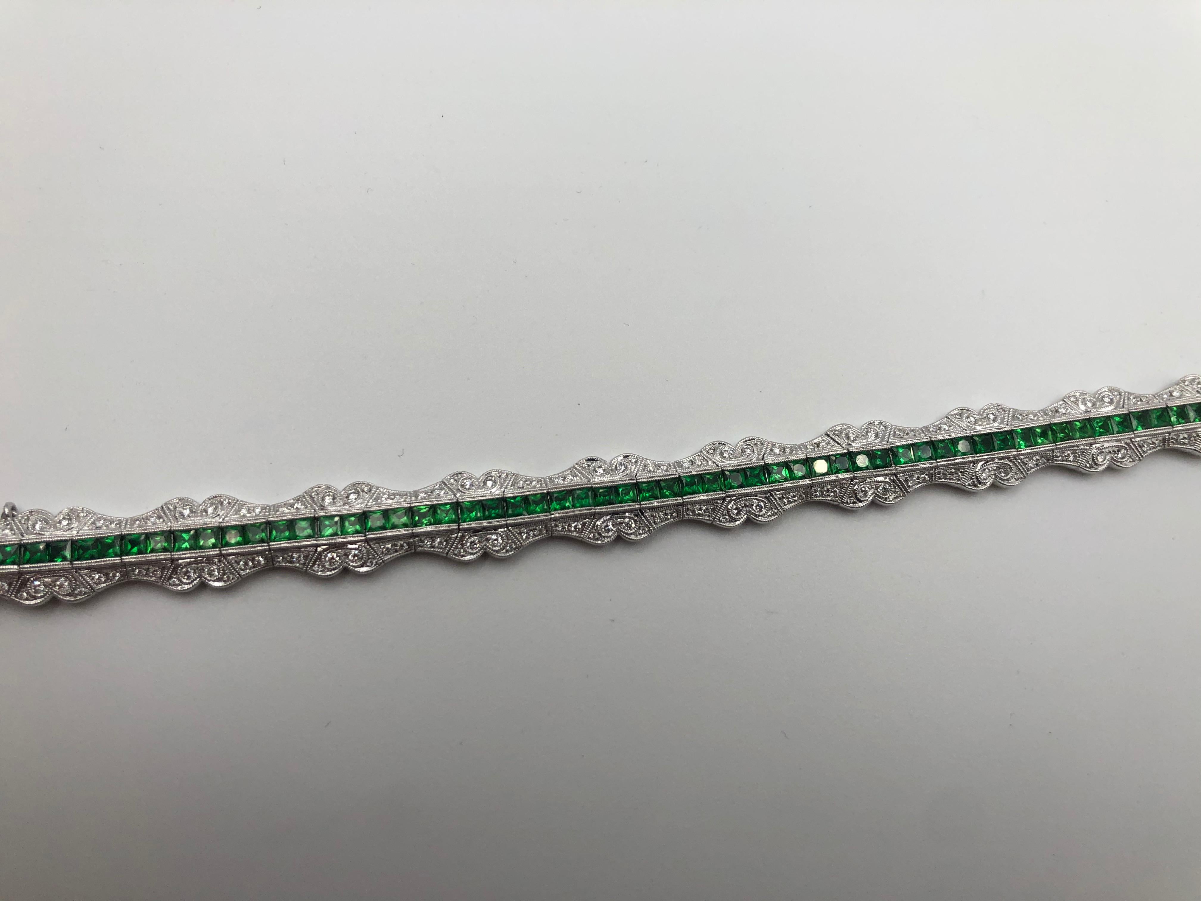 66 Tsavorite Princess Cut Stones 6.98 Ct
176 Round Brilliant Cut Diamonds 1.51 Ct F VS1
18K White Gold
Art Deco Reproduction
Tongue Lock
Length 7.5