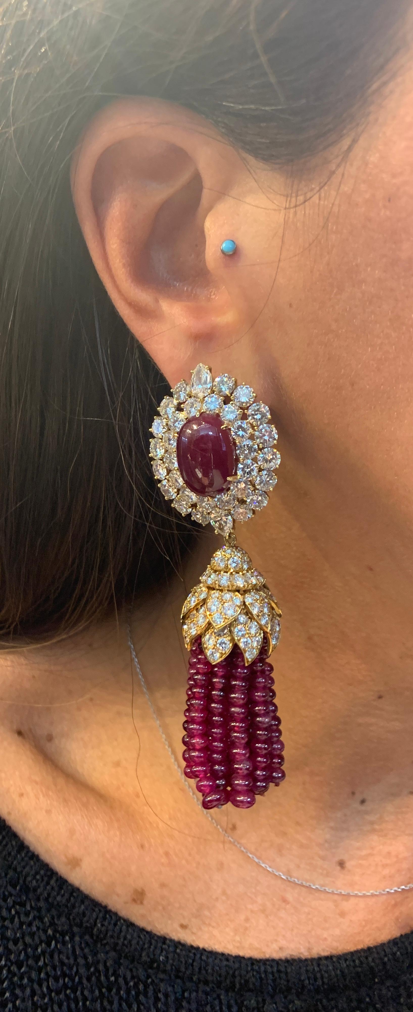 Magnificent Van Cleef & Arpels Day and Night Tassel Earrings

Cabochon rubies, ruby beads and diamonds

Detachable tassels. Both top and bottoms are all signed and numbered

