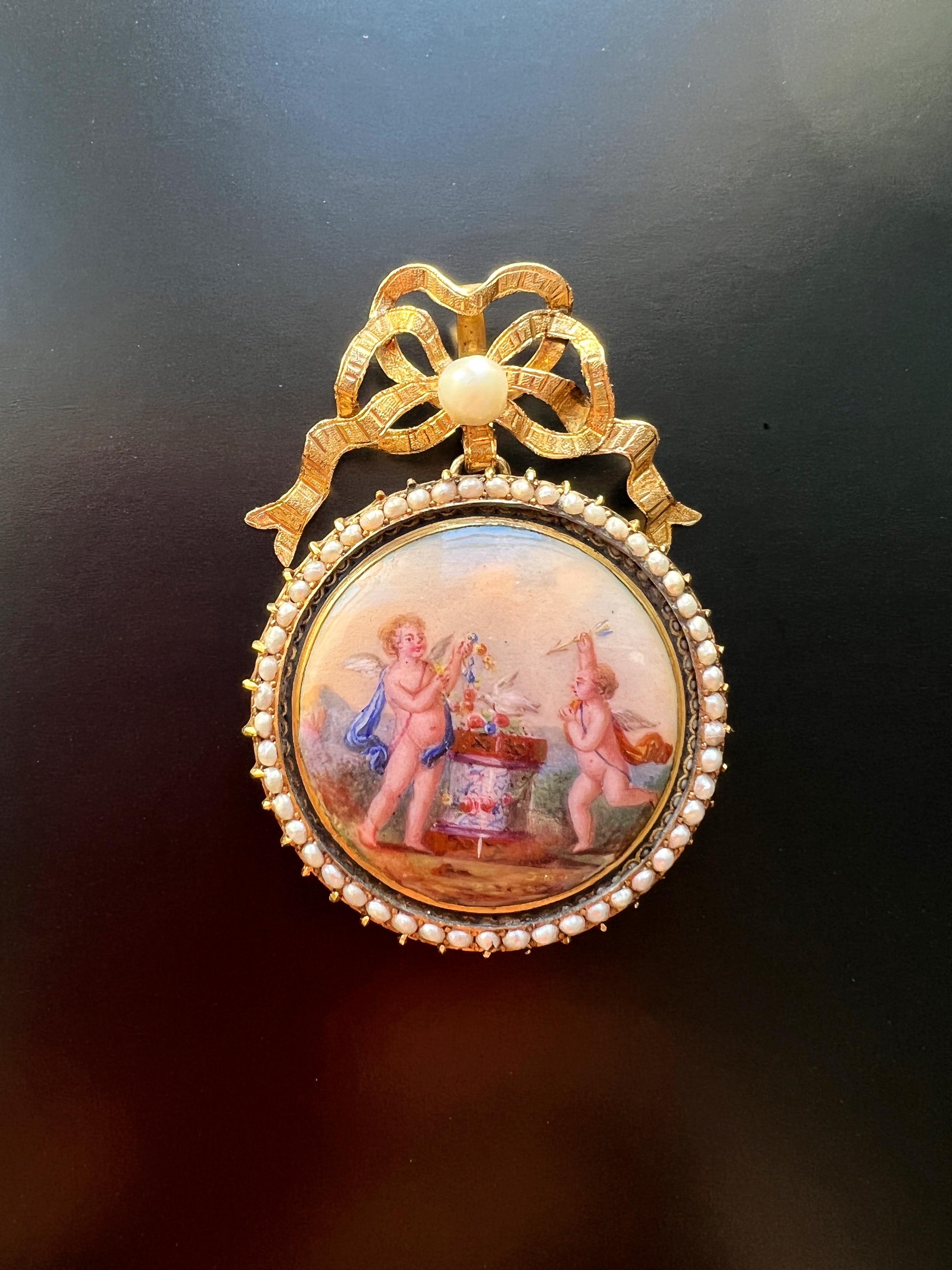 Holding this magnificent pendant in hand, we realized that the art of the miniature painter, enameller, gem-setter and jewelry designer have come together to provide us a feast for the eyes. This very sentimental Victorian era cupid enameled pendant